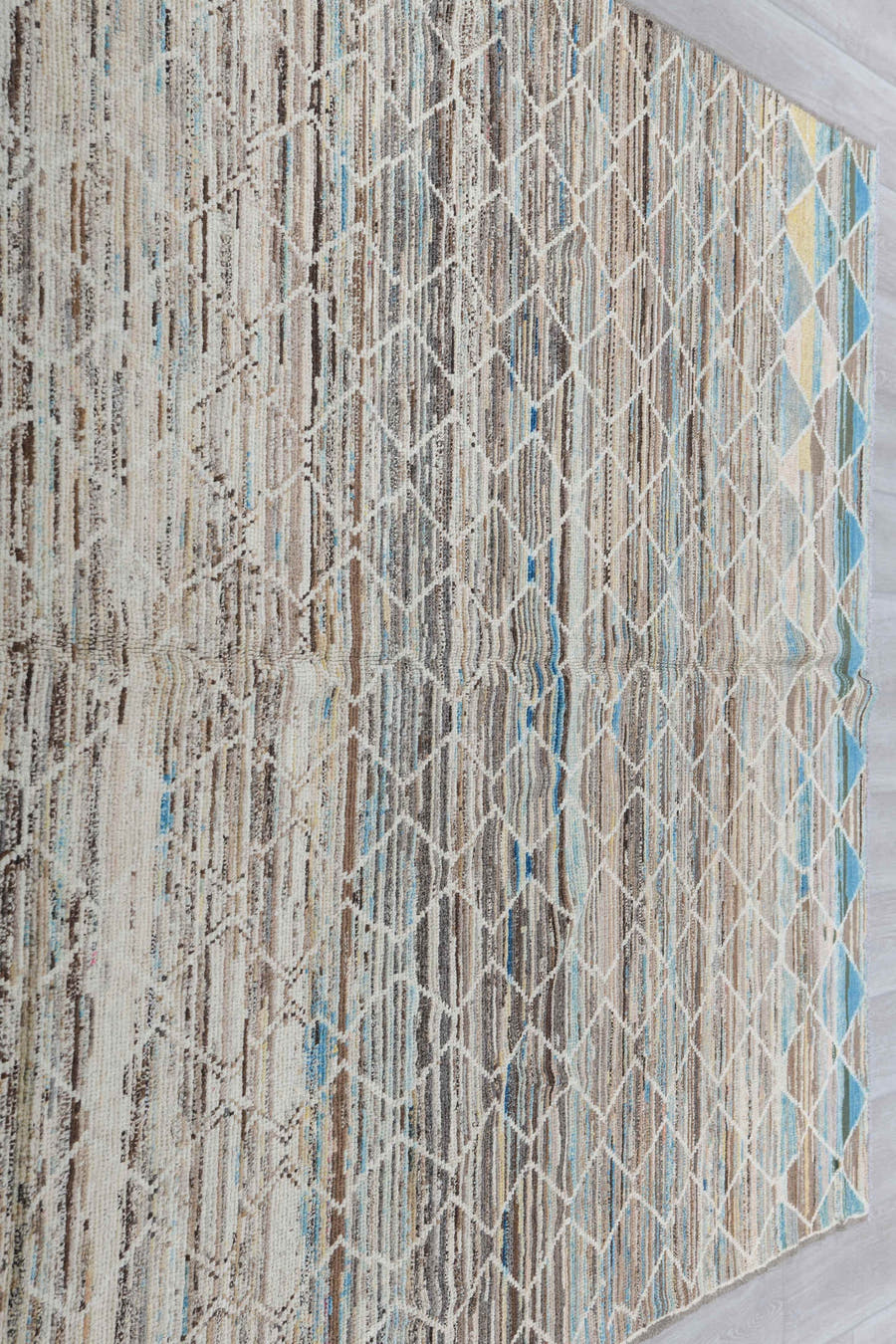 6' x 9' one-of-a-kind handmade vintage Tulu medium size rug. Color palette: ivory, taupe, brown, sky_blue, camel, slate