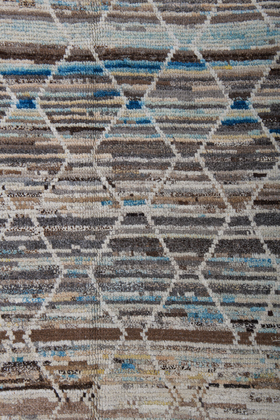 6' x 9' one-of-a-kind handmade vintage Tulu medium size rug. Color palette: ivory, taupe, brown, sky_blue, camel, slate
