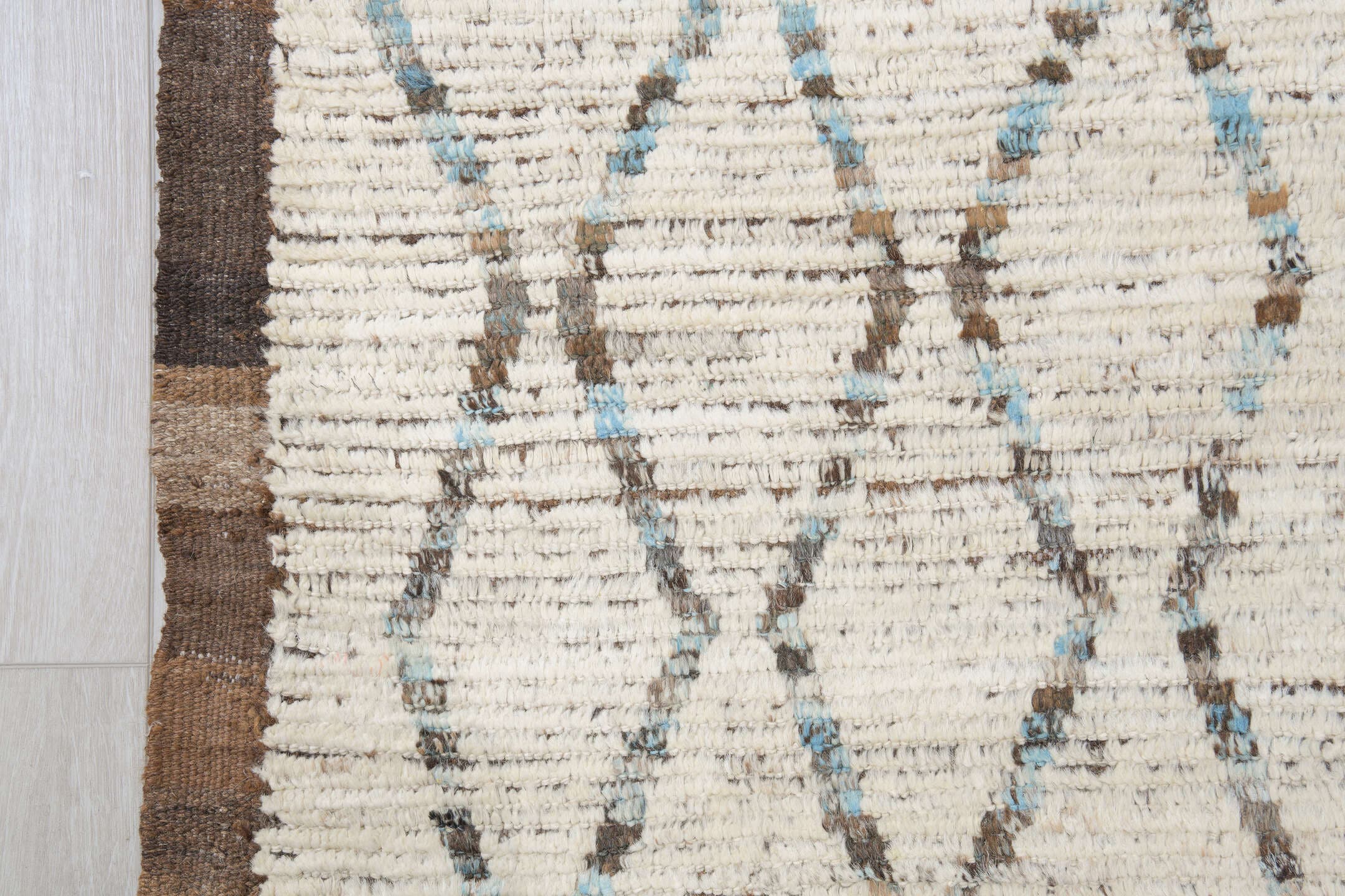 10' x 12' one-of-a-kind handmade vintage Tulu large size rug. Color palette: ivory, brown, charcoal, taupe, faint blue