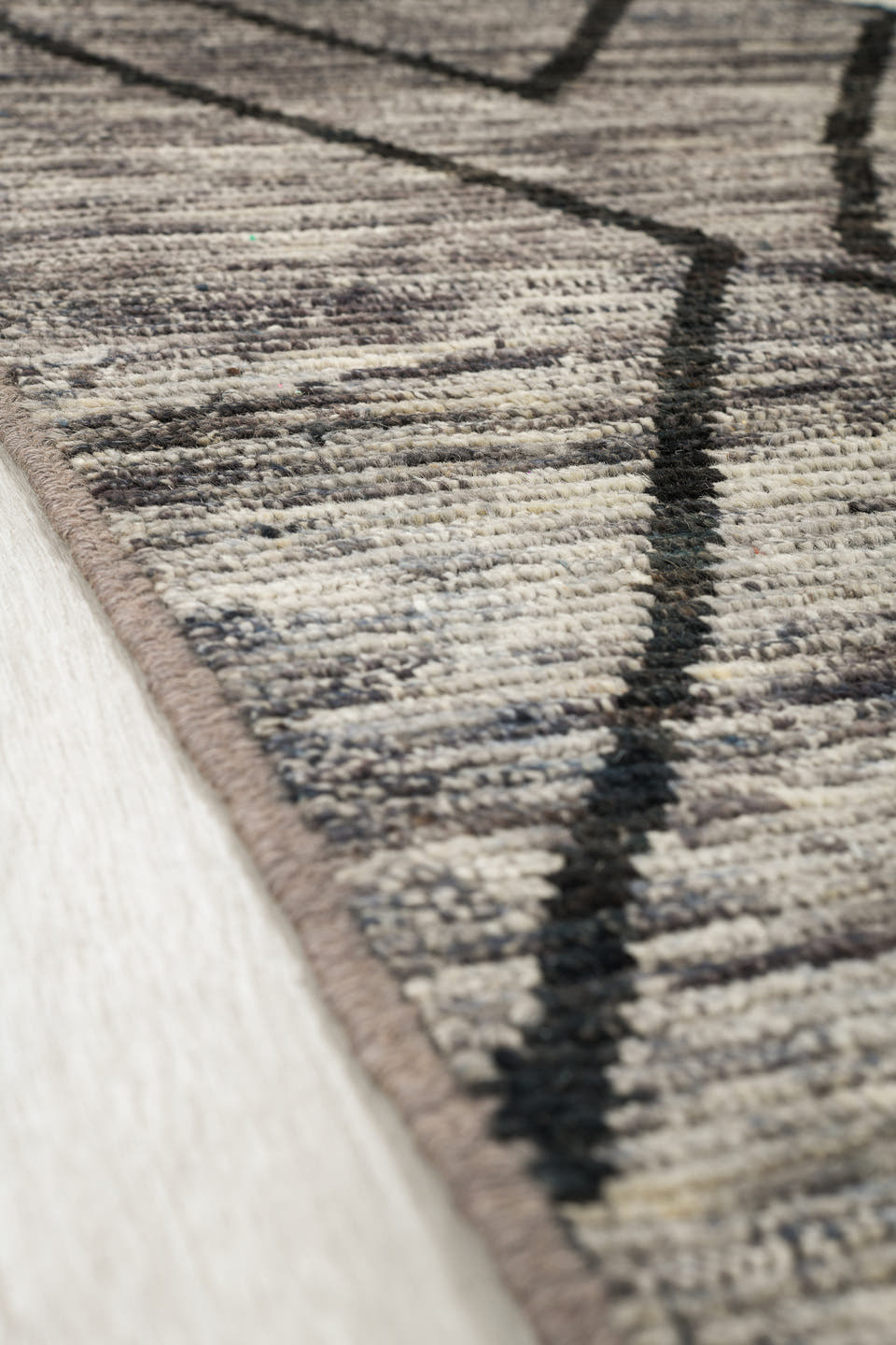 9' x 11' one-of-a-kind handmade vintage Tulu large size rug. Color palette: gray, ivory, charcoal, black