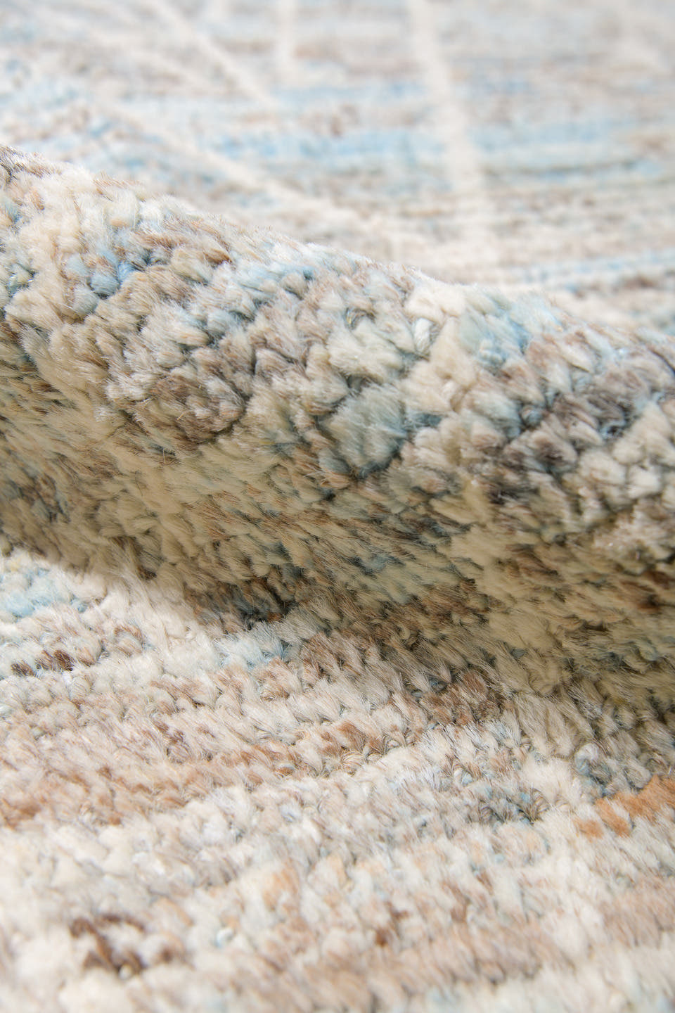 12' x 14' one-of-a-kind handmade vintage Tulu oversize rug. Color palette: ivory, taupe, light blue, beige, gray