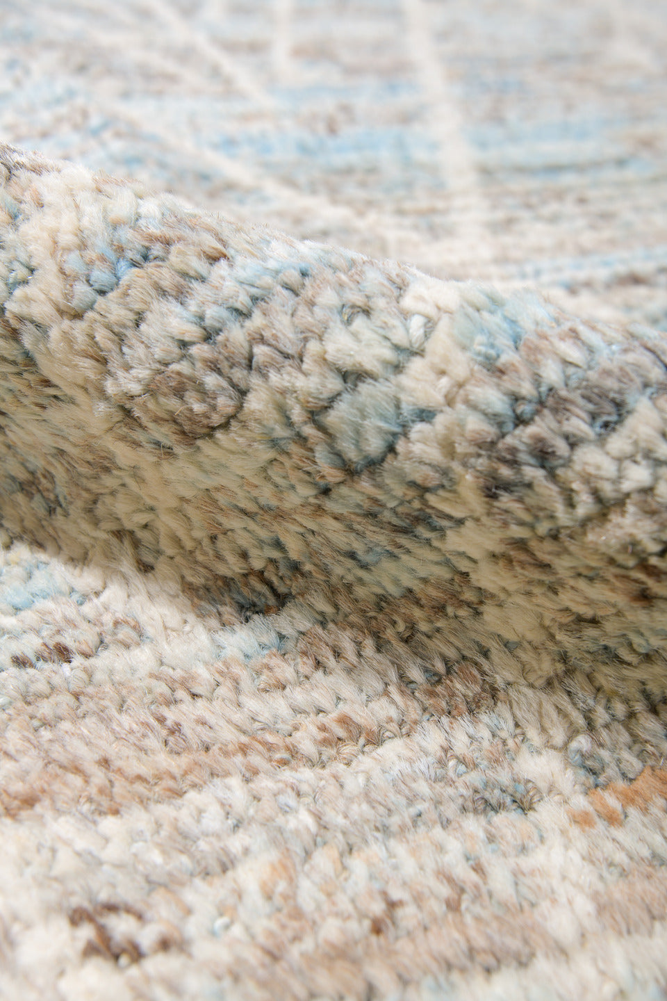 12' x 14' one-of-a-kind handmade vintage Tulu oversize rug. Color palette: ivory, taupe, light blue, beige, gray