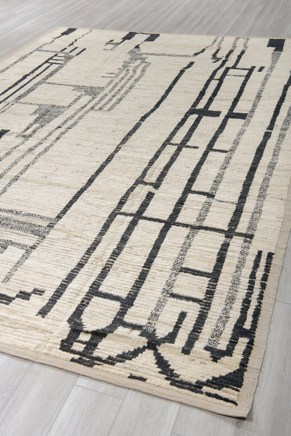 9' x 12' one-of-a-kind handmade vintage Tulu large size rug. Color palette: ivory, black, charcoal, taupe, gray, beige