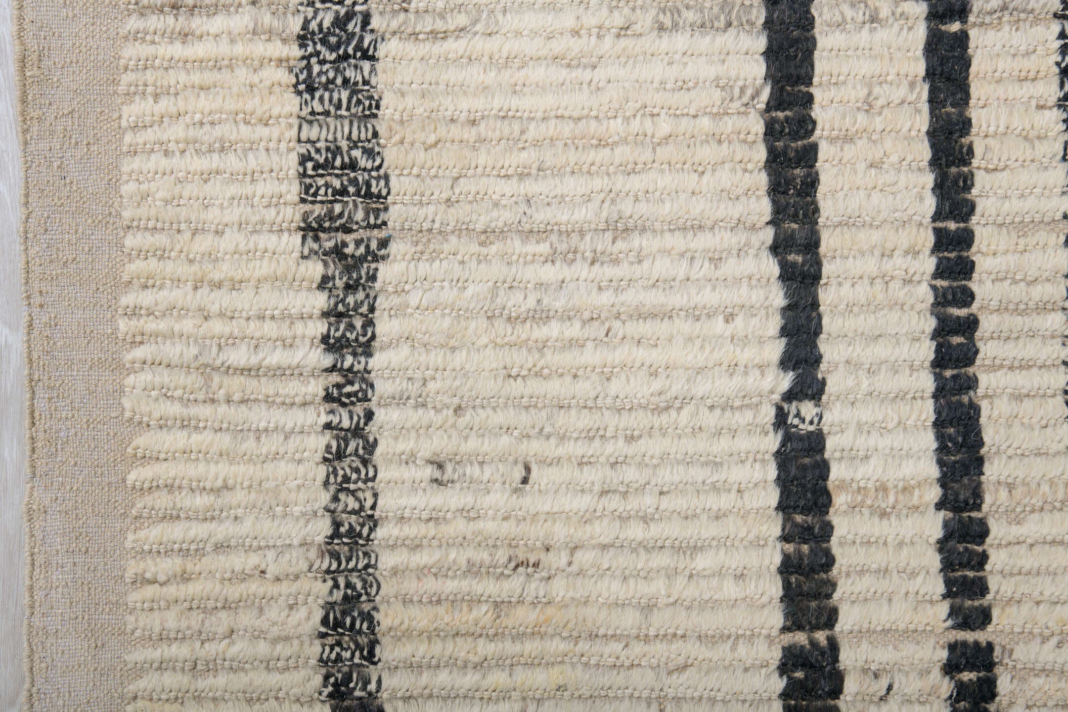 9' x 12' one-of-a-kind handmade vintage Tulu large size rug. Color palette: ivory, black, charcoal, taupe, gray, beige