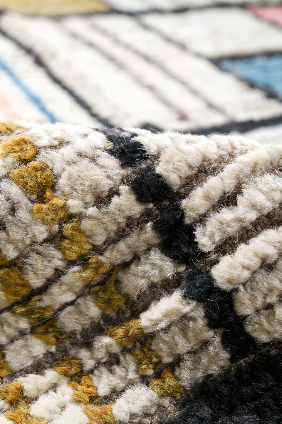 12' x 15' one-of-a-kind handmade vintage Tulu oversize rug. Color palette: ivory, charcoal, taupe, sky blue, coral, camel