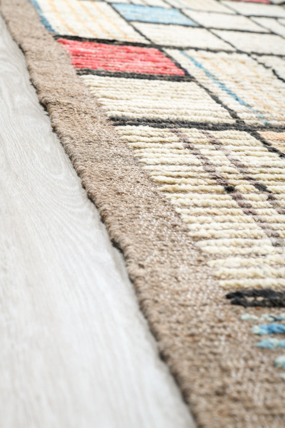 12' x 15' one-of-a-kind handmade vintage Tulu oversize rug. Color palette: ivory, charcoal, taupe, sky blue, coral, camel
