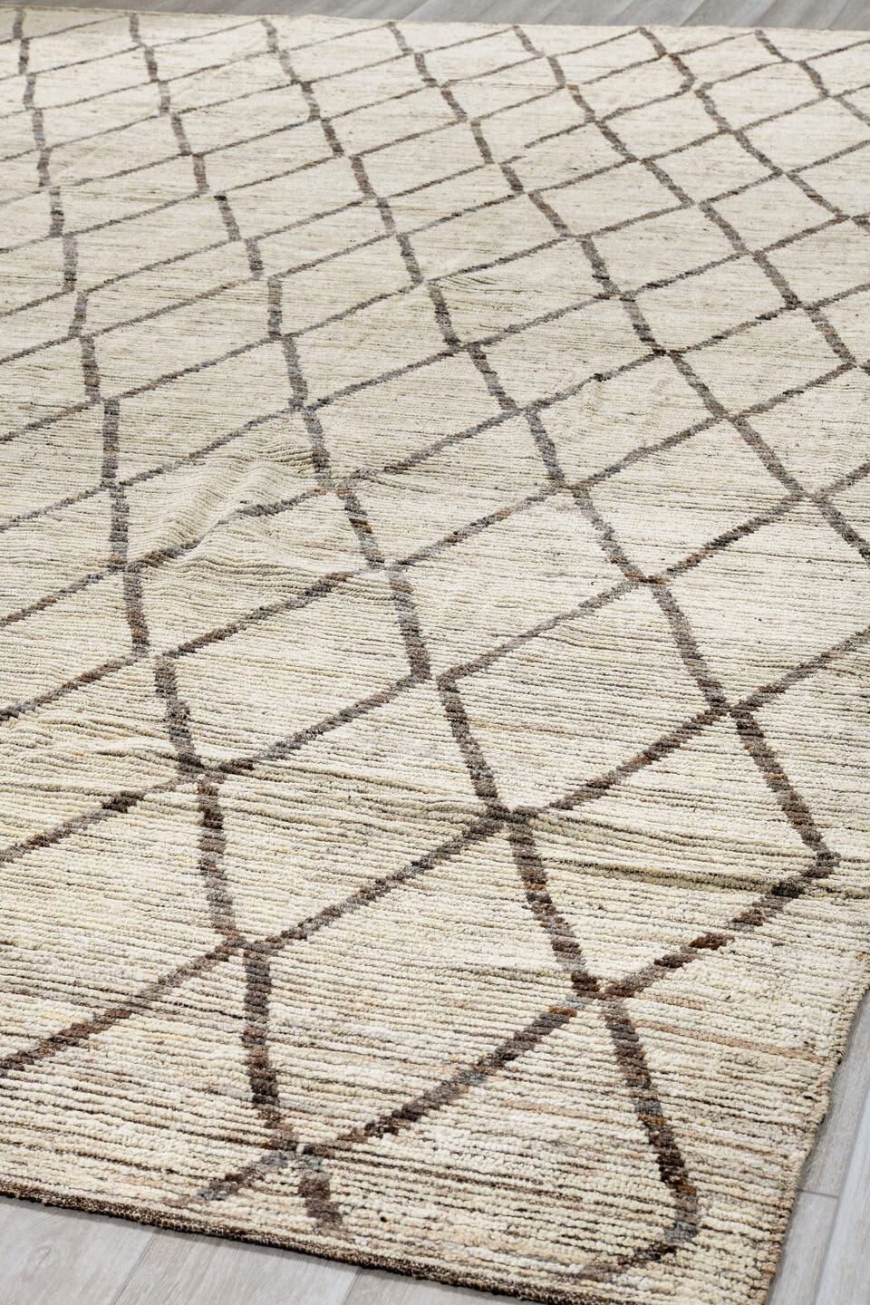 11' x 13' one-of-a-kind handmade vintage Tulu oversize rug. Color palette: ivory, taupe, brown, cream, beige, gray