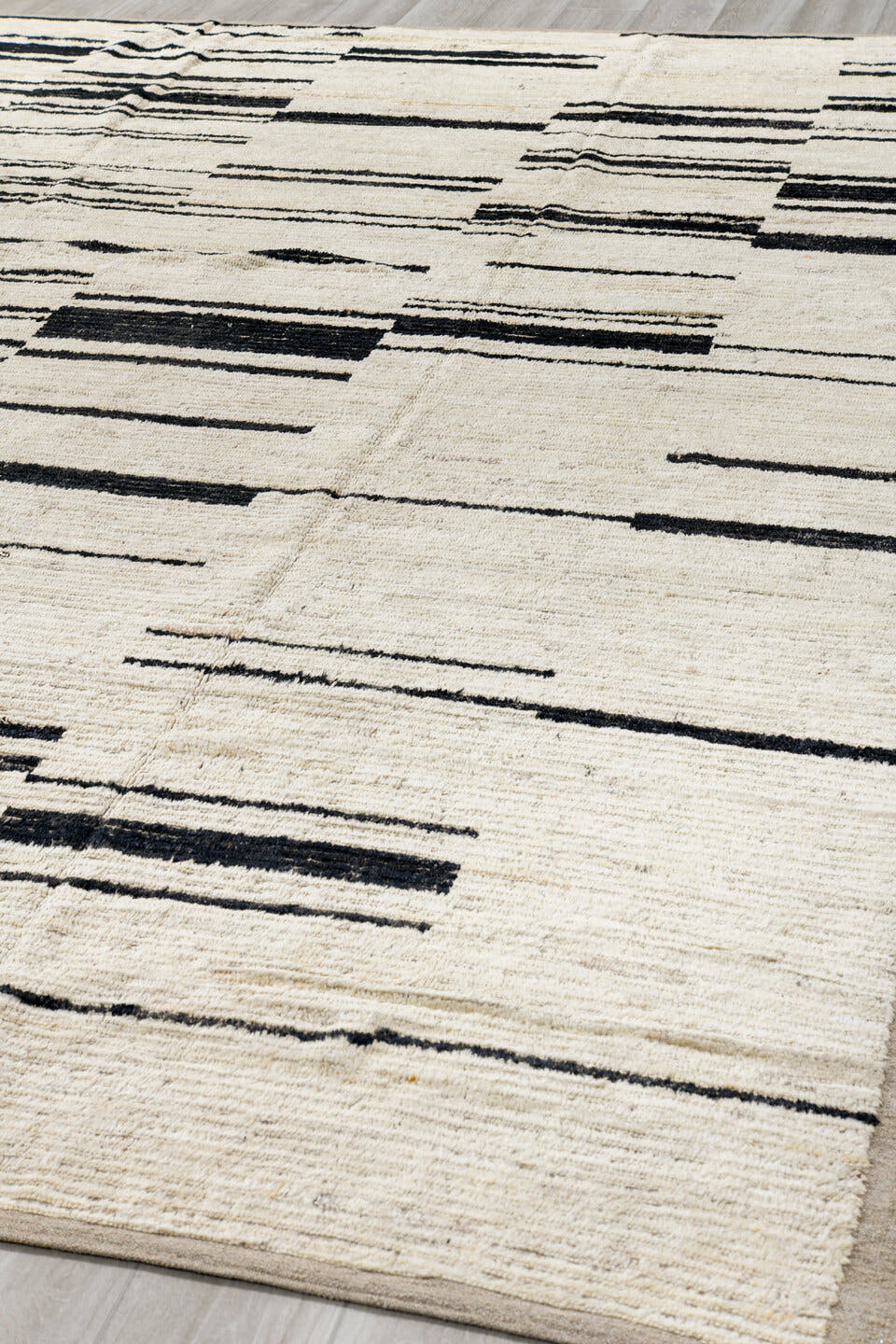8' x 12' one-of-a-kind handmade vintage Tulu large size rug. Color palette: ivory, charcoal, taupe, gray, black, beige
