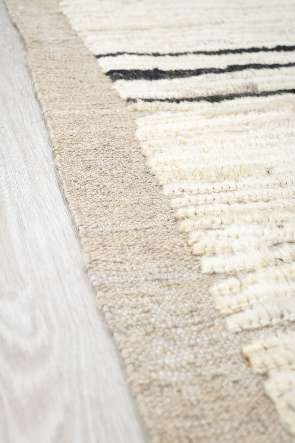 8' x 12' one-of-a-kind handmade vintage Tulu large size rug. Color palette: ivory, charcoal, taupe, gray, black, beige