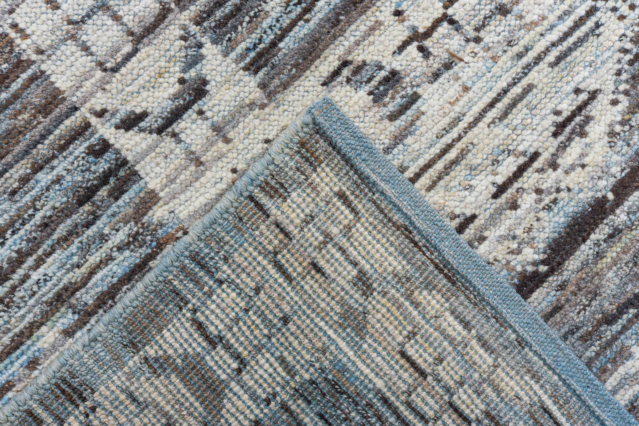 9' x 14' one-of-a-kind handmade vintage Tulu large size rug. Color palette: charcoal, ivory, sky blue, slate, cream, gray