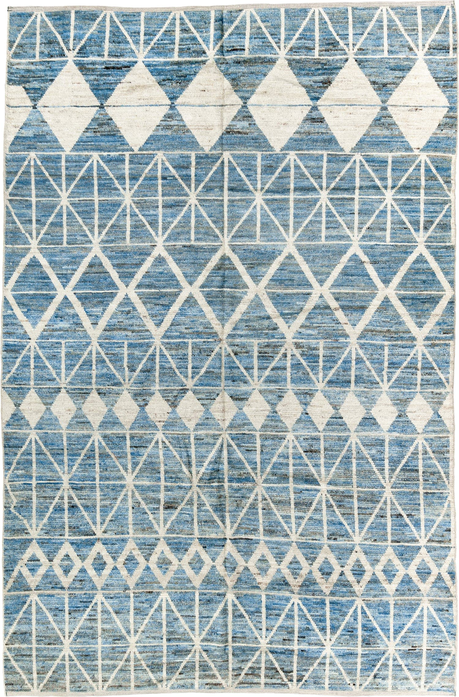 6' x 9' one-of-a-kind handmade vintage Tulu medium size rug. Color palette: sky blue, ivory, slate, denim, light blue, gray