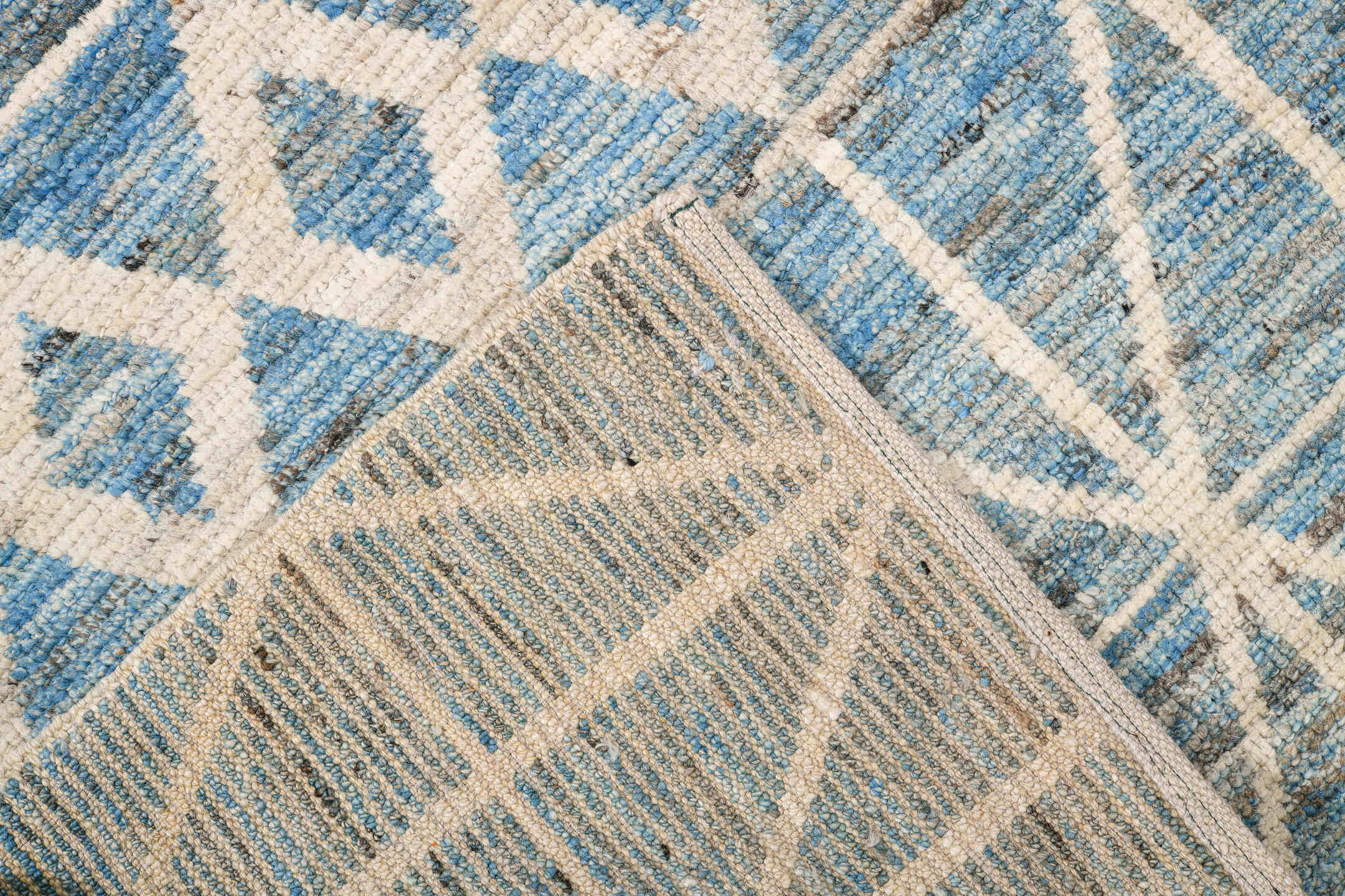 6' x 9' one-of-a-kind handmade vintage Tulu medium size rug. Color palette: sky blue, ivory, slate, denim, light blue, gray