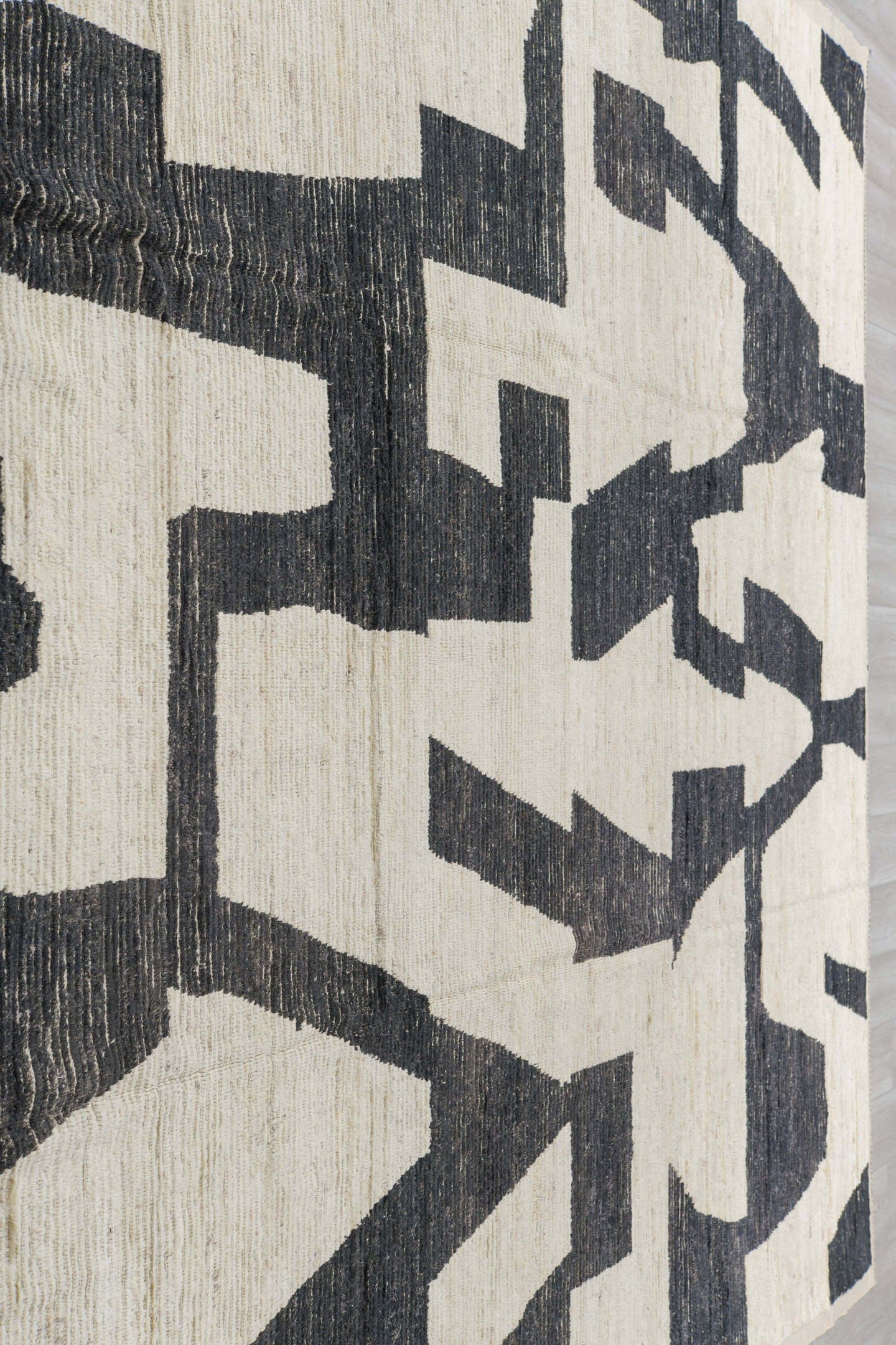 10' x 13' one-of-a-kind handmade vintage Tulu oversize rug. Color palette: ivory, charcoal, cream, black, gray