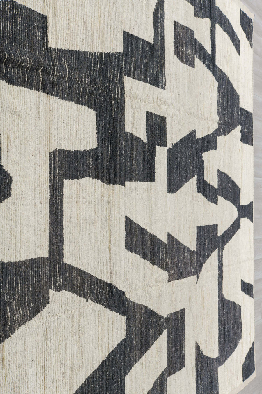 10' x 13' one-of-a-kind handmade vintage Tulu oversize rug. Color palette: ivory, charcoal, cream, black, gray