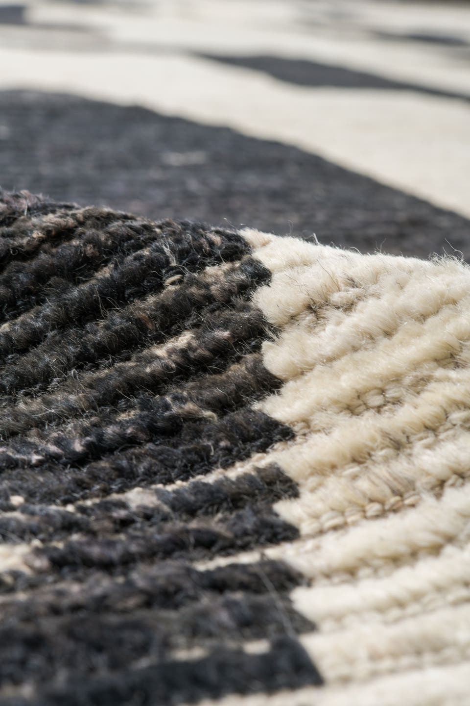 10' x 13' one-of-a-kind handmade vintage Tulu oversize rug. Color palette: ivory, charcoal, cream, black, gray