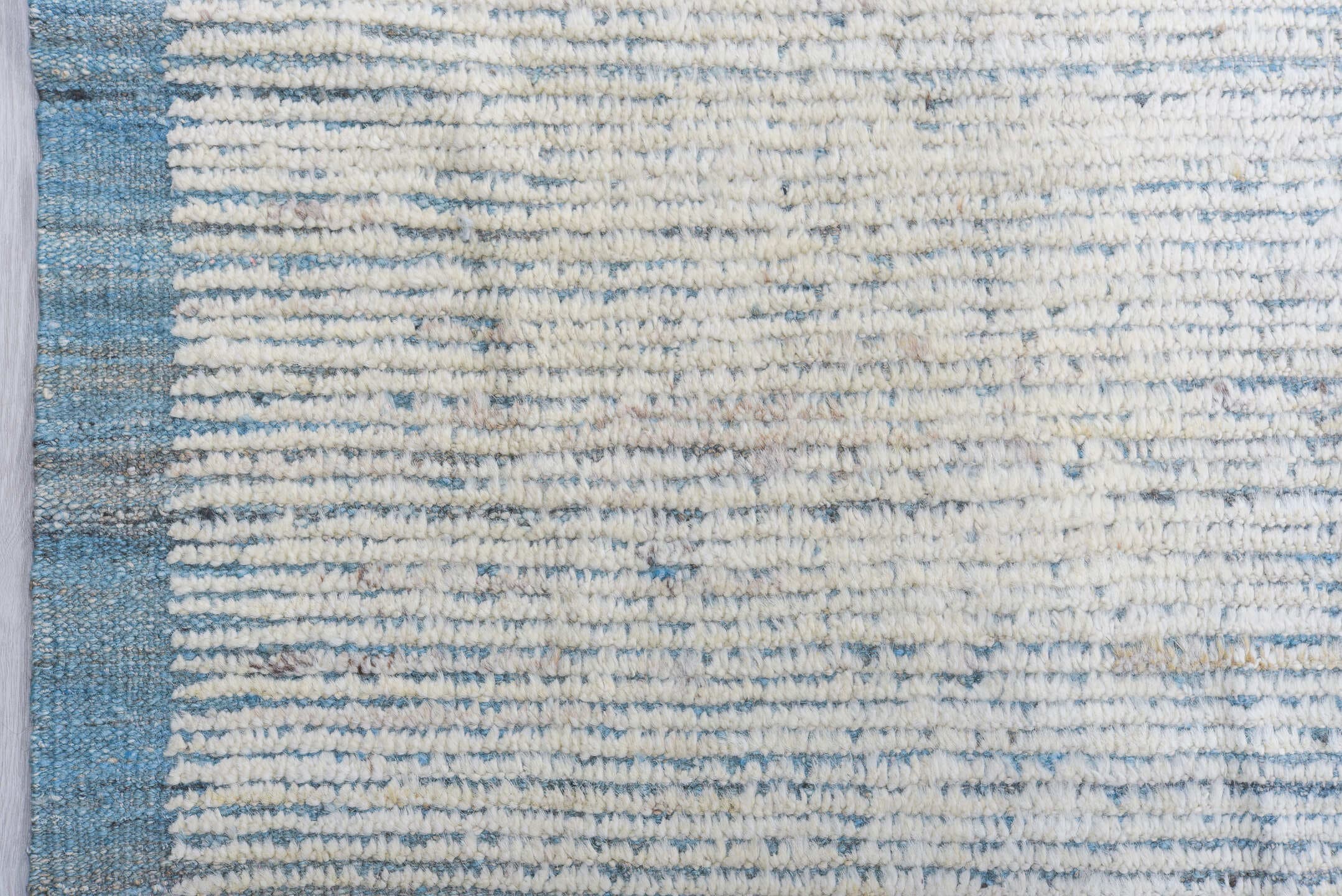 13' x 16' one-of-a-kind handmade vintage Tulu oversize rug. Color palette: ivory, pale blue, cream, light gray, light blue