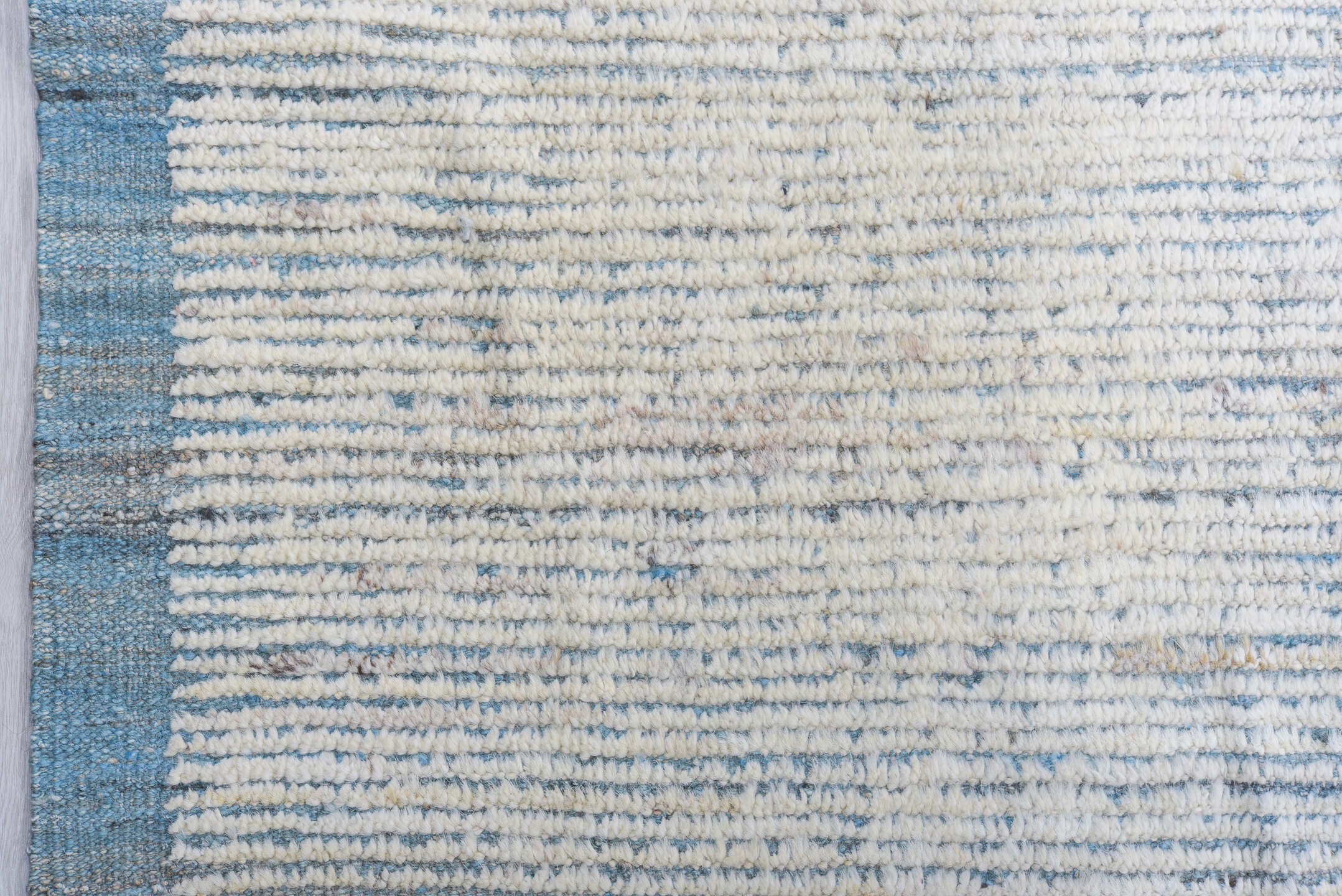 13' x 16' one-of-a-kind handmade vintage Tulu oversize rug. Color palette: ivory, pale blue, cream, light gray, light blue