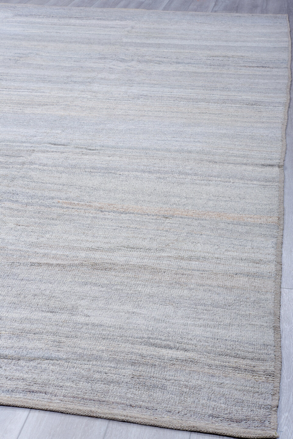 9' x 14' one-of-a-kind handmade vintage Tulu large size rug. Color palette: pale blue, ivory, light gray, taupe, light blue