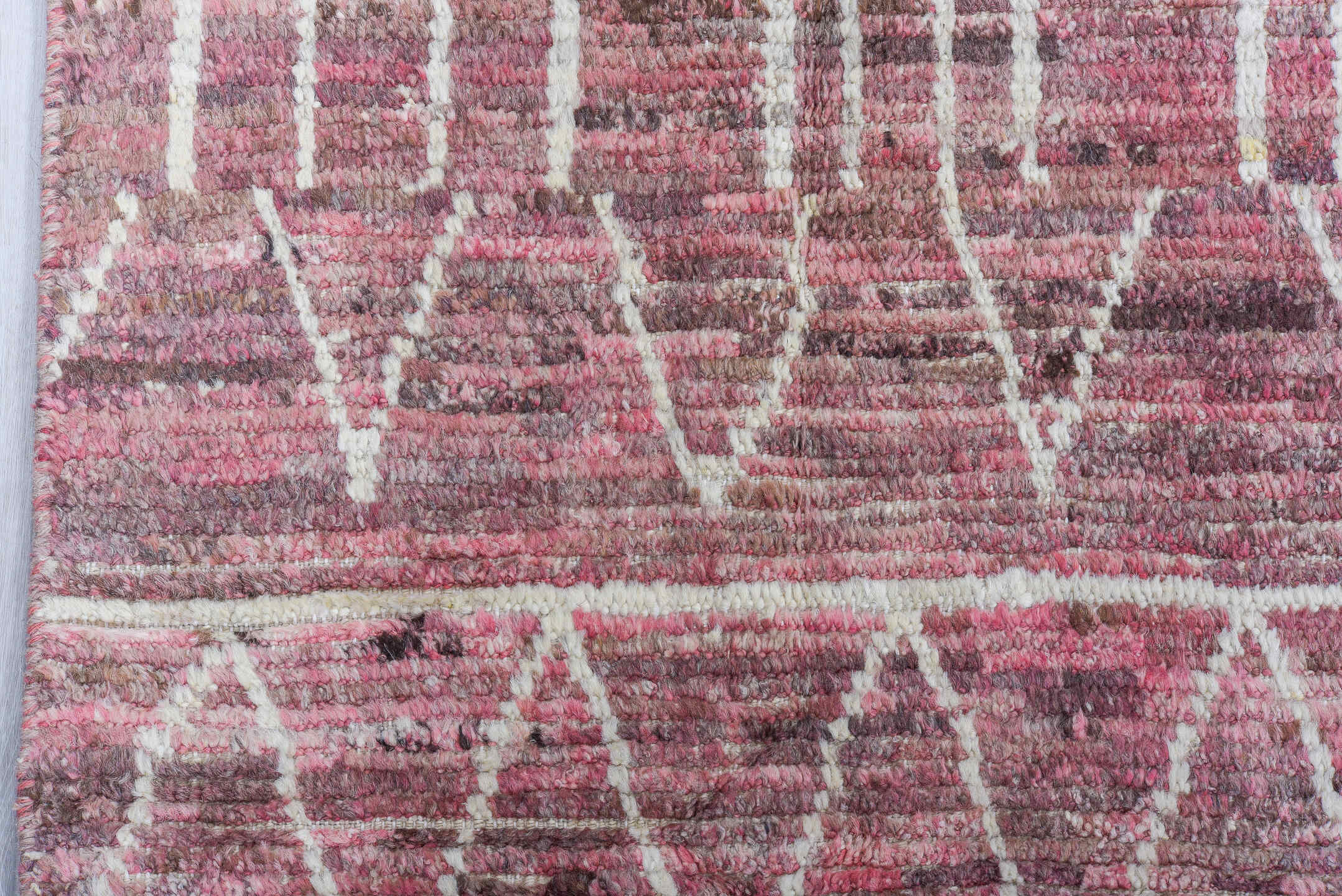 7' x 9' one-of-a-kind handmade vintage Tulu rug. Color palette: rose, mauve, ivory, dusty pink, taupe, brown, pink, red