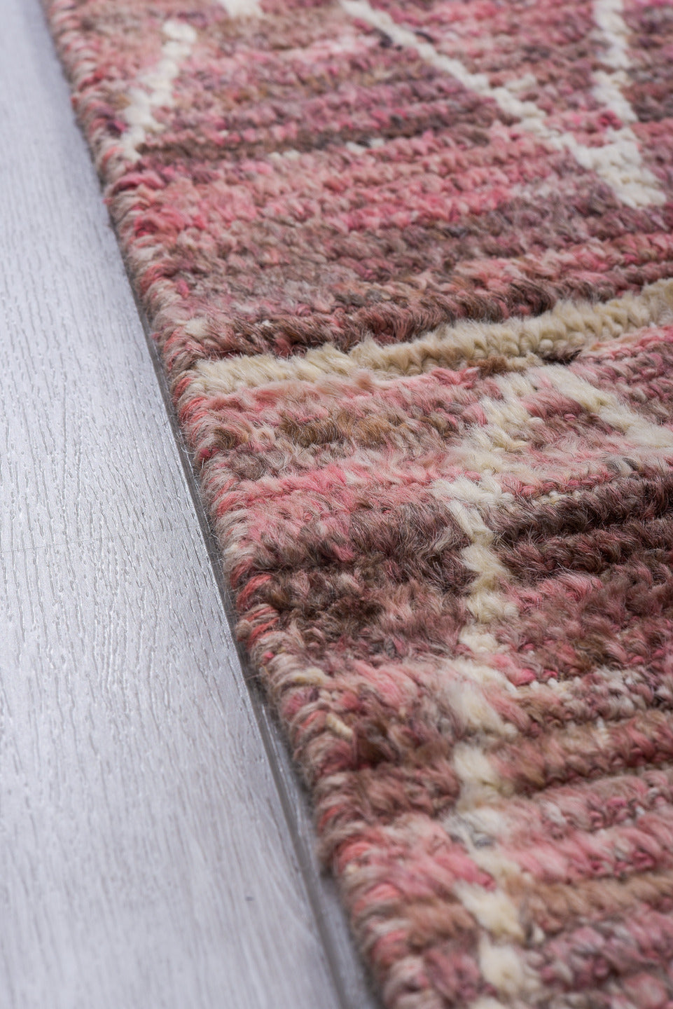 7' x 9' one-of-a-kind handmade vintage Tulu rug. Color palette: rose, mauve, ivory, dusty pink, taupe, brown, pink, red