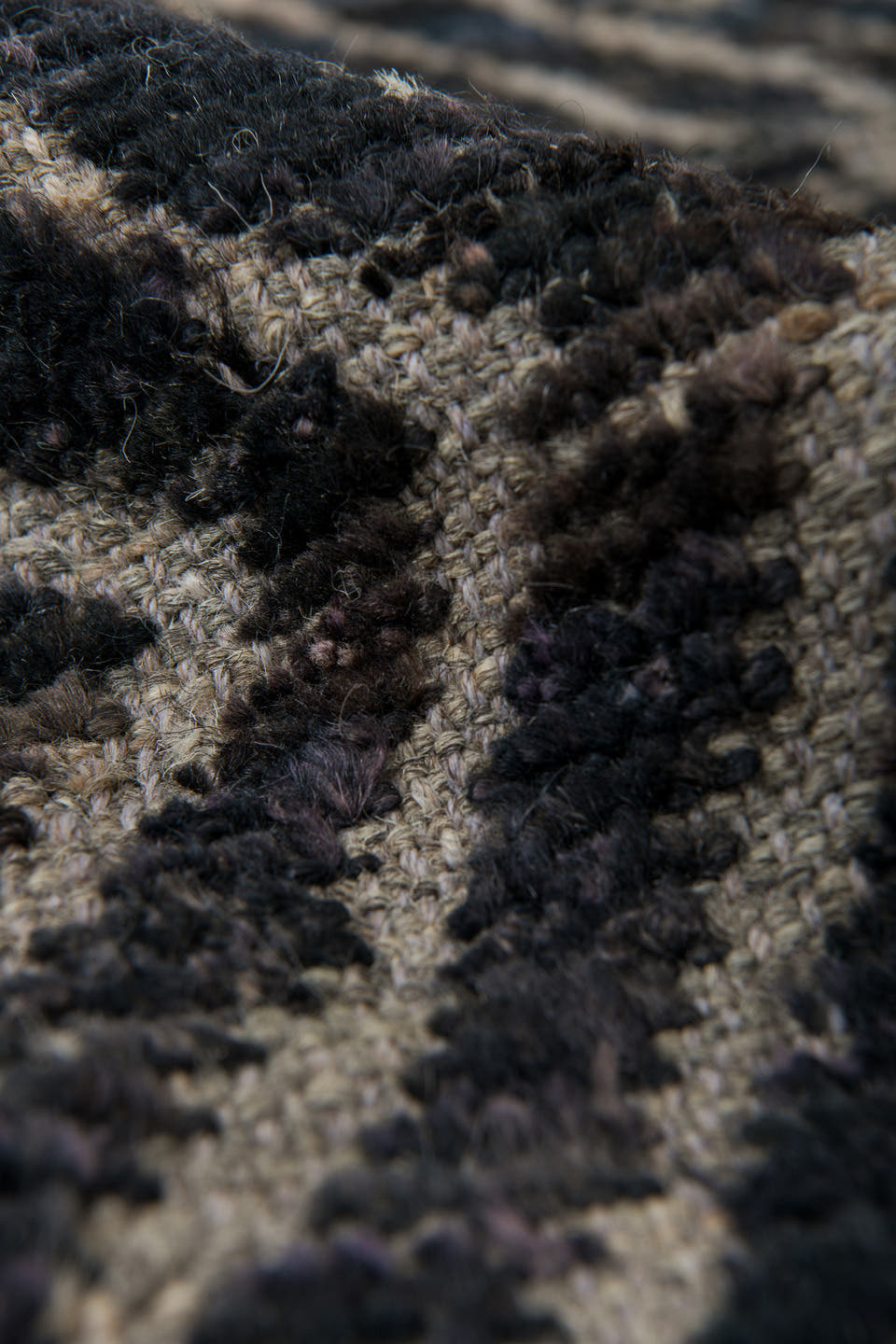 5' x 9' one-of-a-kind handmade vintage Tulu medium size rug. Color palette: ivory, charcoal, black, slate, gray