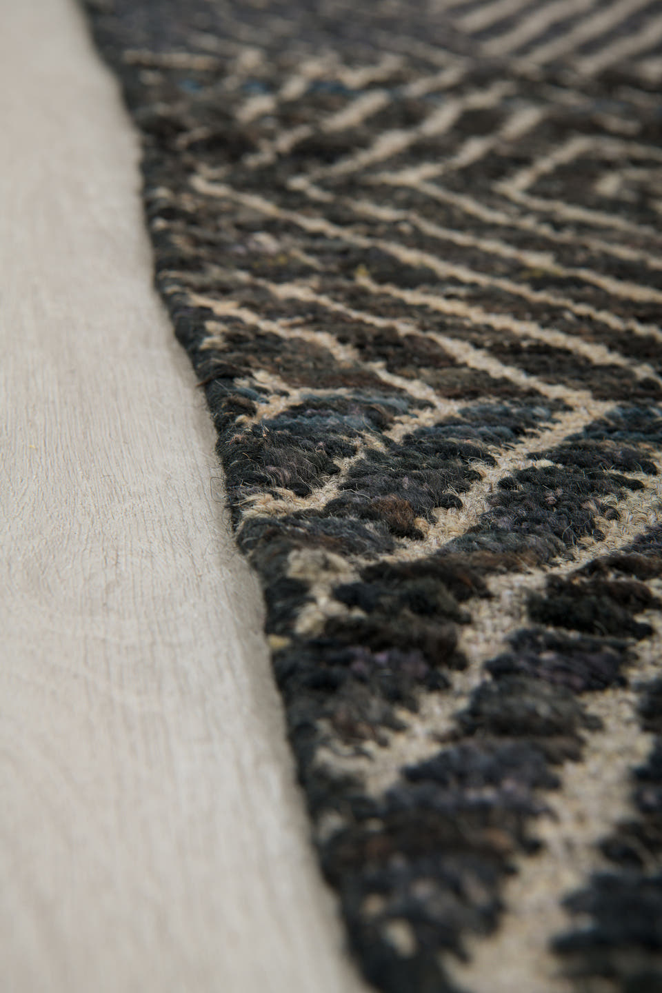 5' x 9' one-of-a-kind handmade vintage Tulu medium size rug. Color palette: ivory, charcoal, black, slate, gray