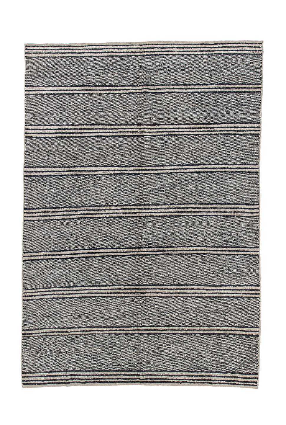 6' x 9' one-of-a-kind handmade vintage Tulu medium size rug. Color palette: charcoal, ivory, gray, black