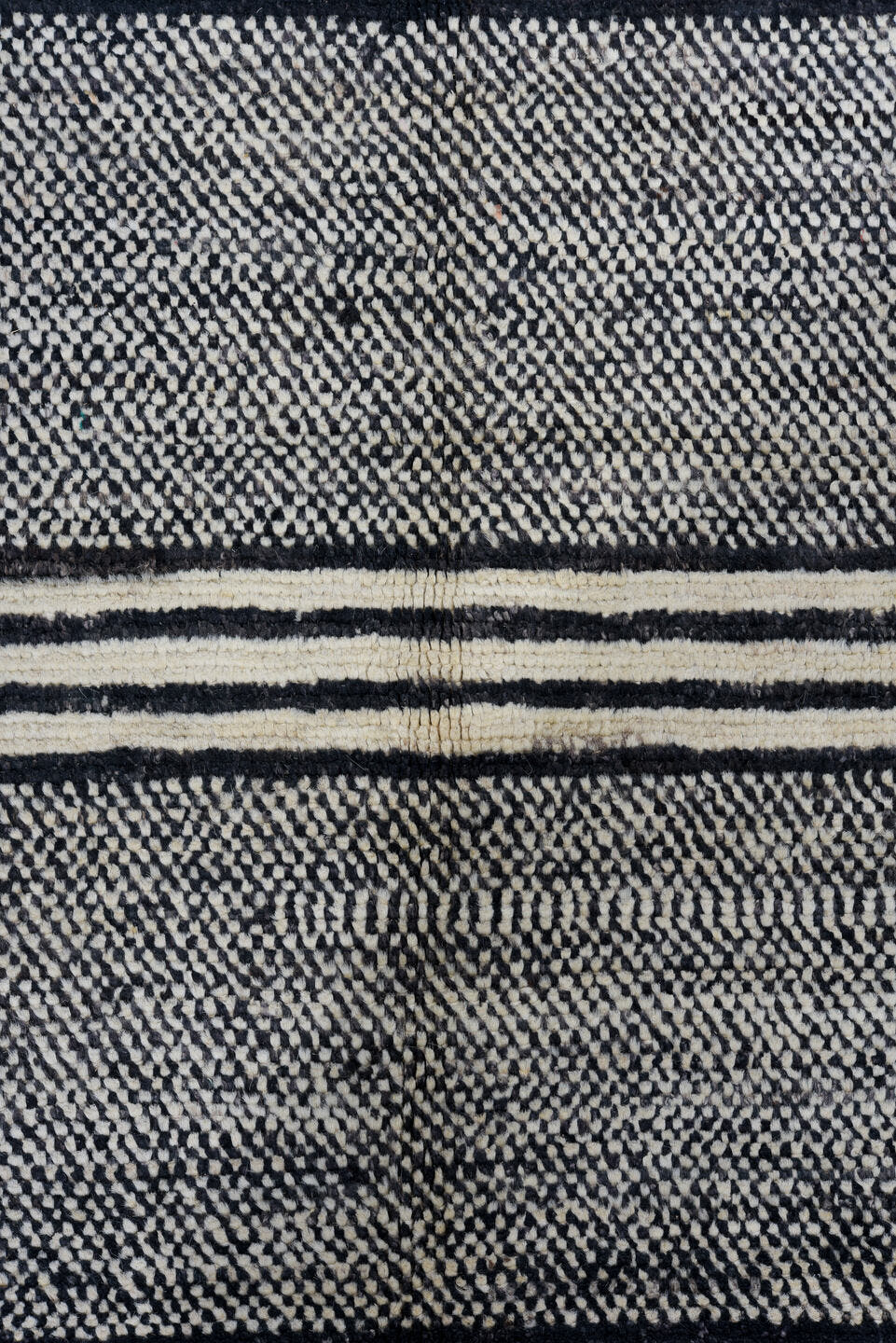 6' x 9' one-of-a-kind handmade vintage Tulu medium size rug. Color palette: charcoal, ivory, gray, black