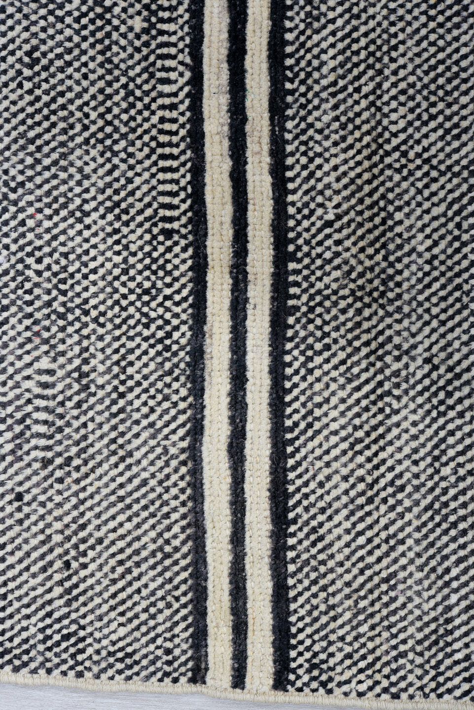 6' x 9' one-of-a-kind handmade vintage Tulu medium size rug. Color palette: charcoal, ivory, gray, black