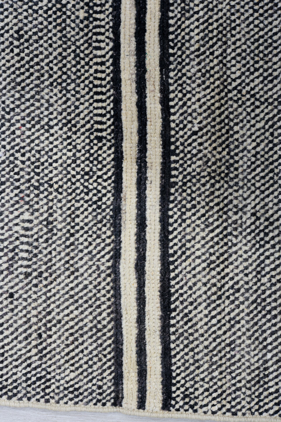6' x 9' one-of-a-kind handmade vintage Tulu medium size rug. Color palette: charcoal, ivory, gray, black