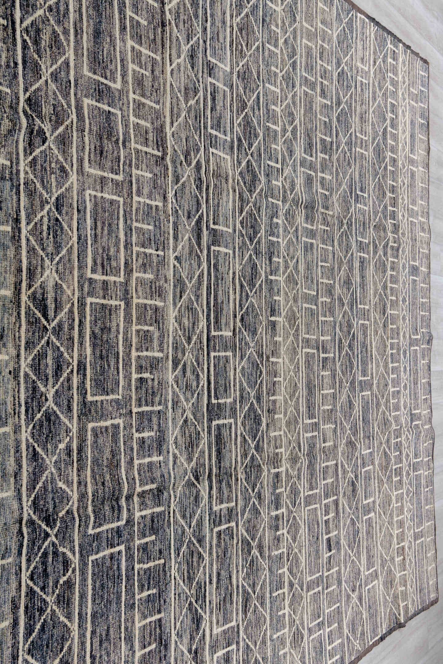 9' x 11' one-of-a-kind handmade vintage Tulu large size rug. Color palette: charcoal, ivory, slate, taupe, gray, black