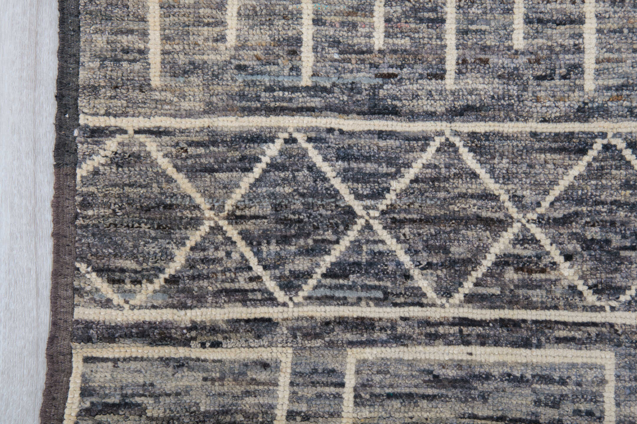 9' x 11' one-of-a-kind handmade vintage Tulu large size rug. Color palette: black, blue, brown, charcoal, dark gray