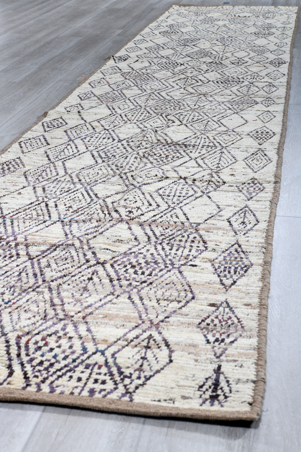 3' x 16' one-of-a-kind handmade vintage Tulu runner rug. Color palette: ivory, charcoal, taupe, brown, gray, black, beige