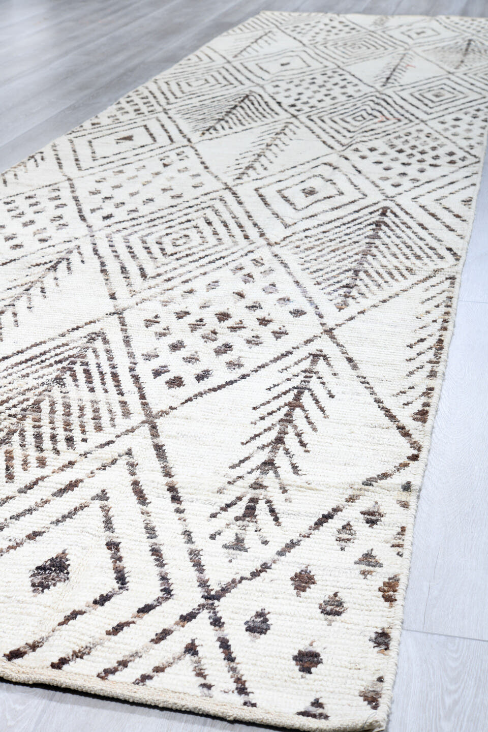 4' x 18' one-of-a-kind handmade vintage Tulu runner rug. Color palette: ivory, charcoal, taupe, brown, black, gray, beige