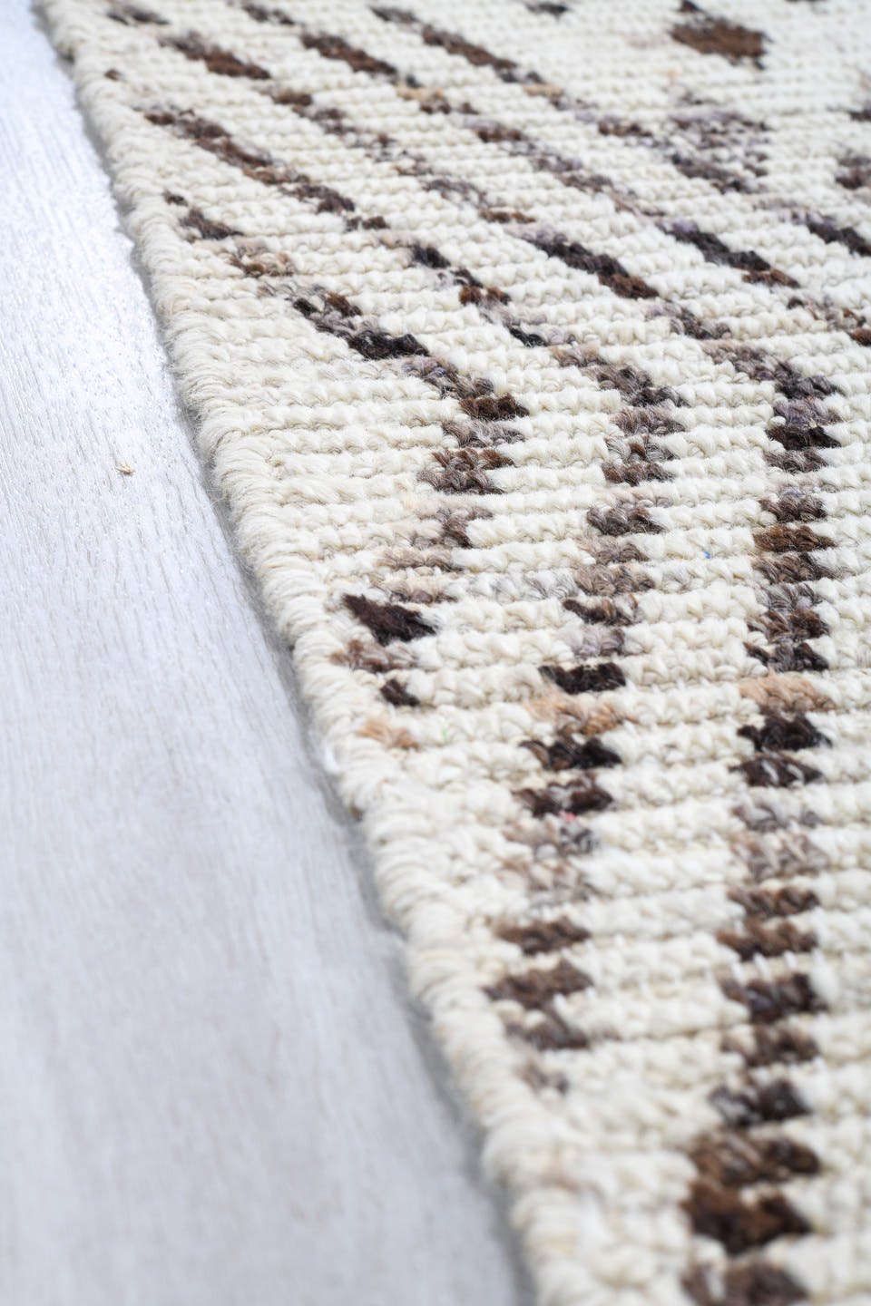4' x 18' one-of-a-kind handmade vintage Tulu runner rug. Color palette: ivory, charcoal, taupe, brown, black, gray, beige
