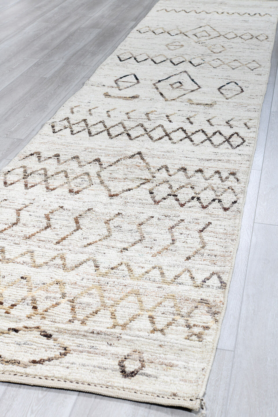 3' x 16' one-of-a-kind handmade vintage Tulu runner rug. Color palette: ivory, taupe, brown, camel, gray, beige