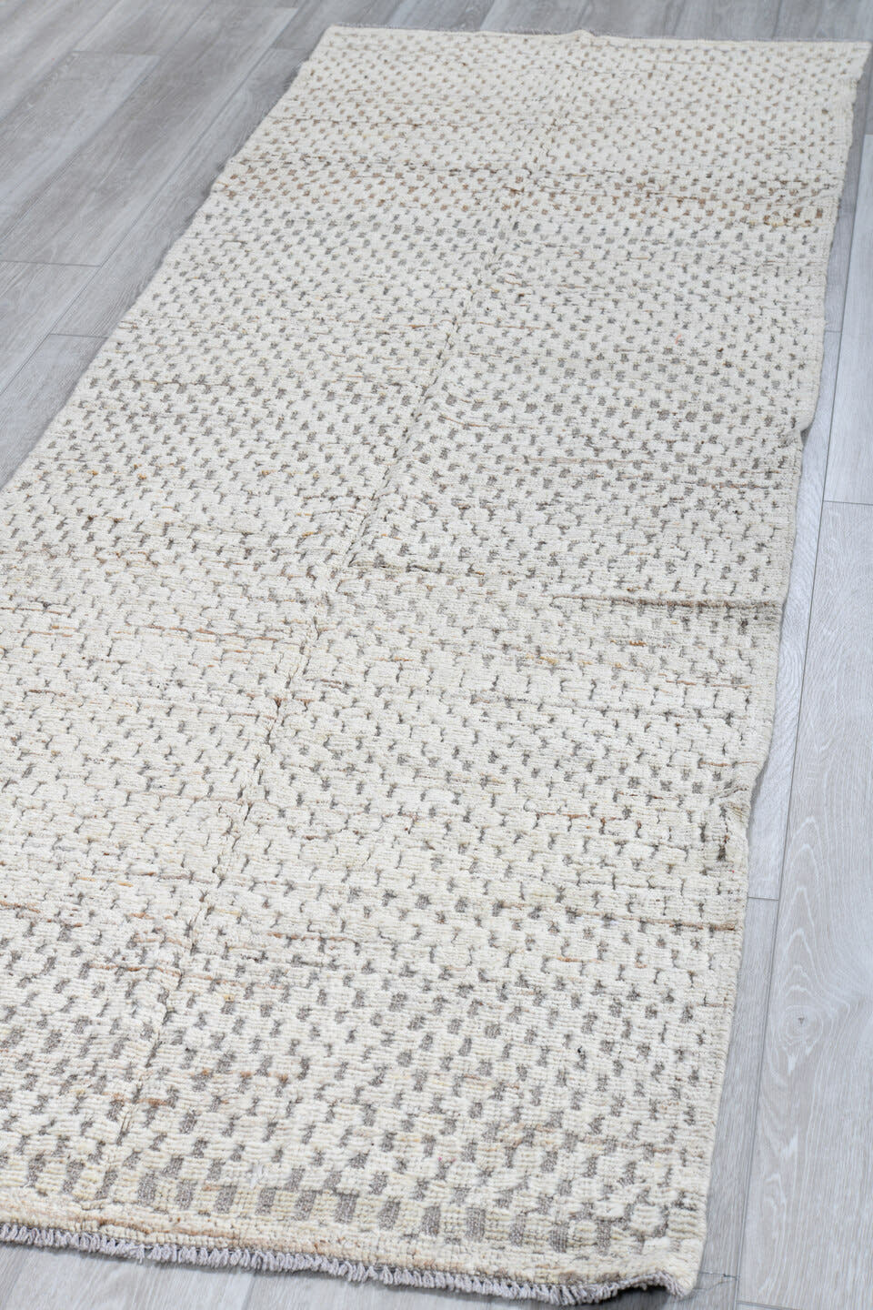 3' x 9' one-of-a-kind handmade vintage Tulu runner rug. Color palette: ivory, taupe, light gray, beige, gray