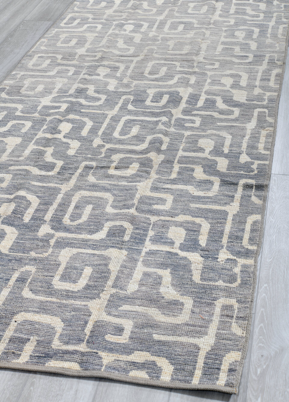 4' x 9' one-of-a-kind handmade vintage Tulu runner rug. Color palette: black, dark gray, dim gray, gainsboro, gray