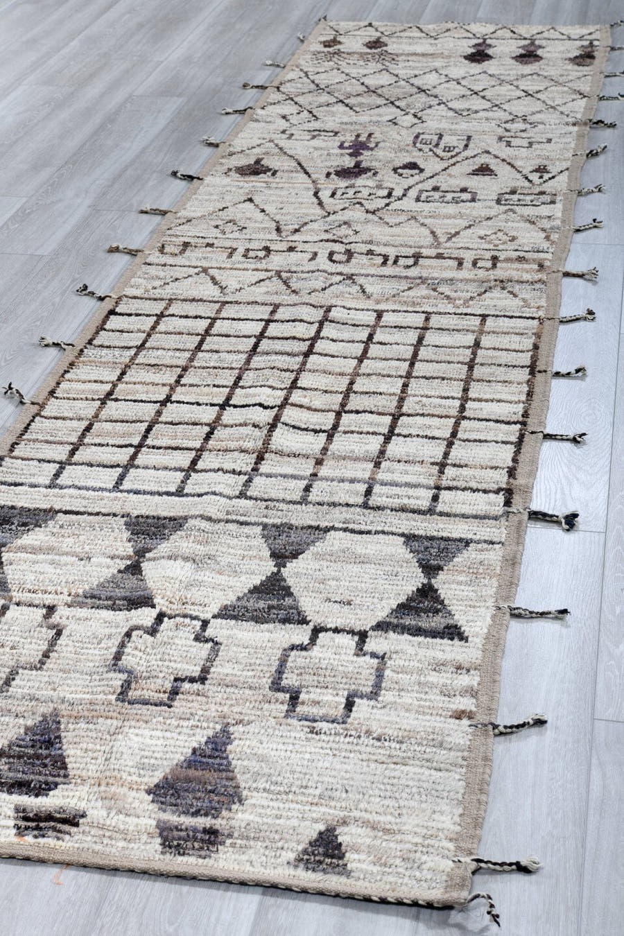 3' x 13' one-of-a-kind handmade vintage Tulu runner rug. Color palette: ivory, taupe, charcoal, brown, gray, beige, black
