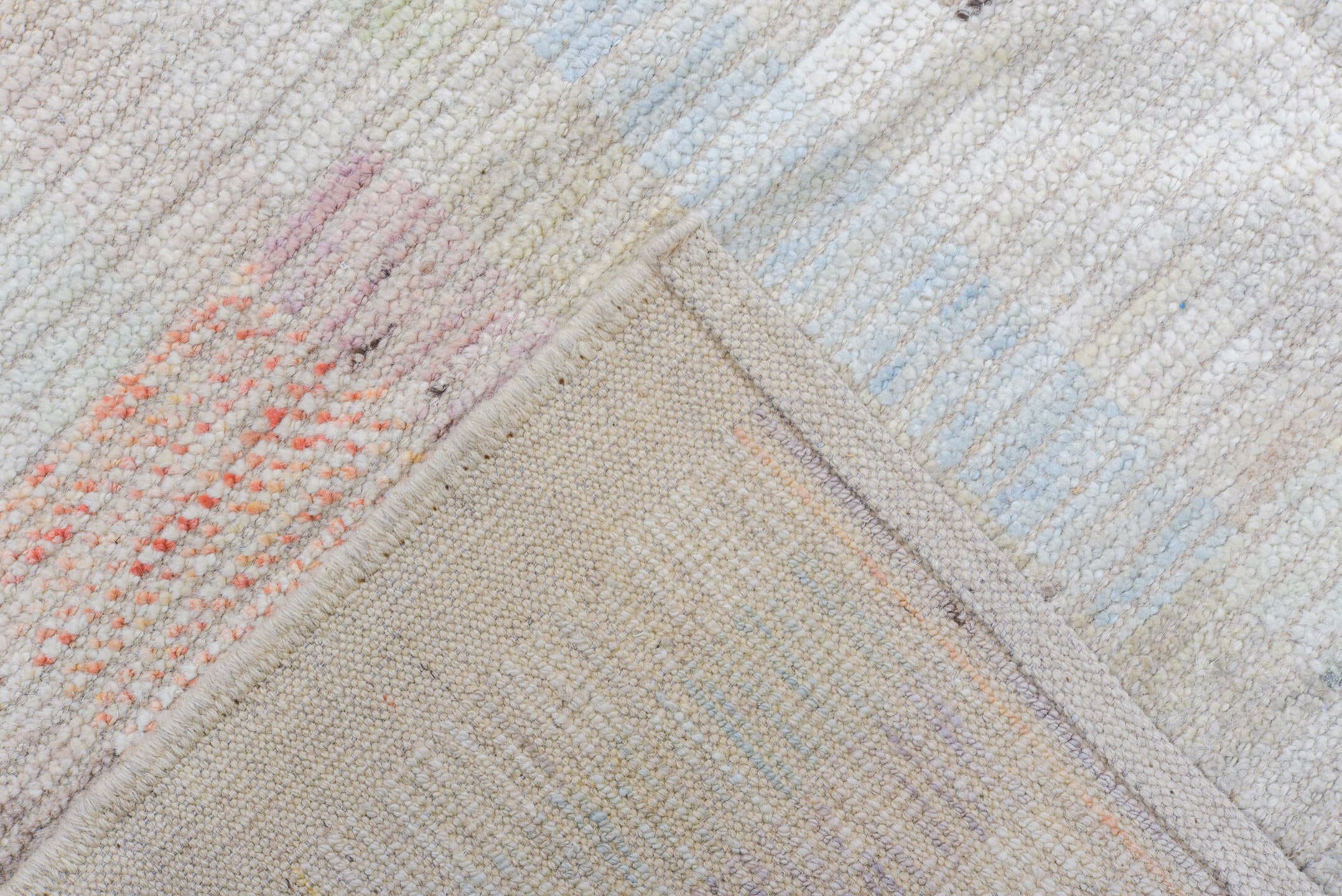 8' x 9' one-of-a-kind handmade vintage Tulu rug. Color palette: ivory, pale blue, peach, lavender, soft gold, sage, blush