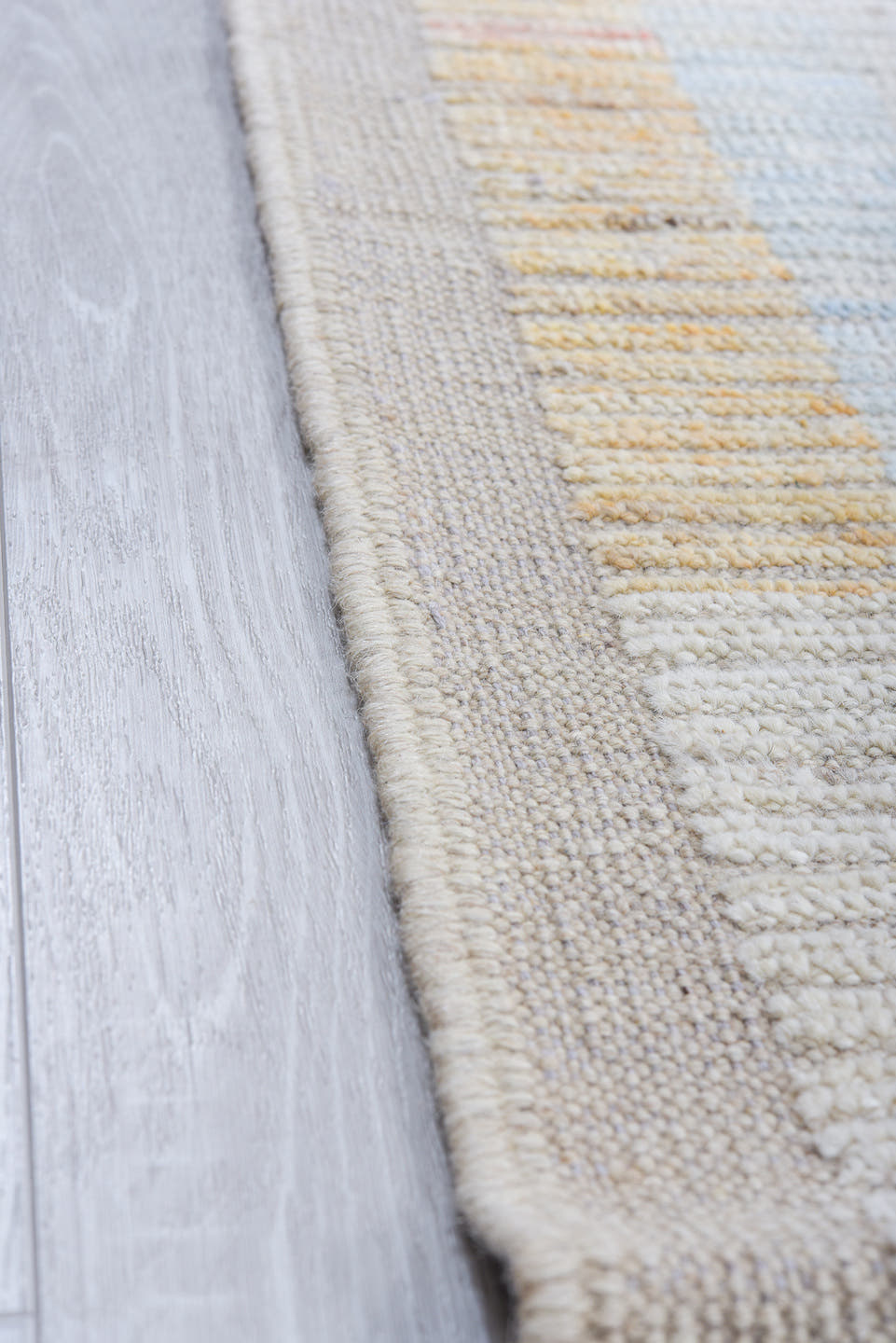 8' x 9' one-of-a-kind handmade vintage Tulu rug. Color palette: ivory, pale blue, peach, lavender, soft gold, sage, blush
