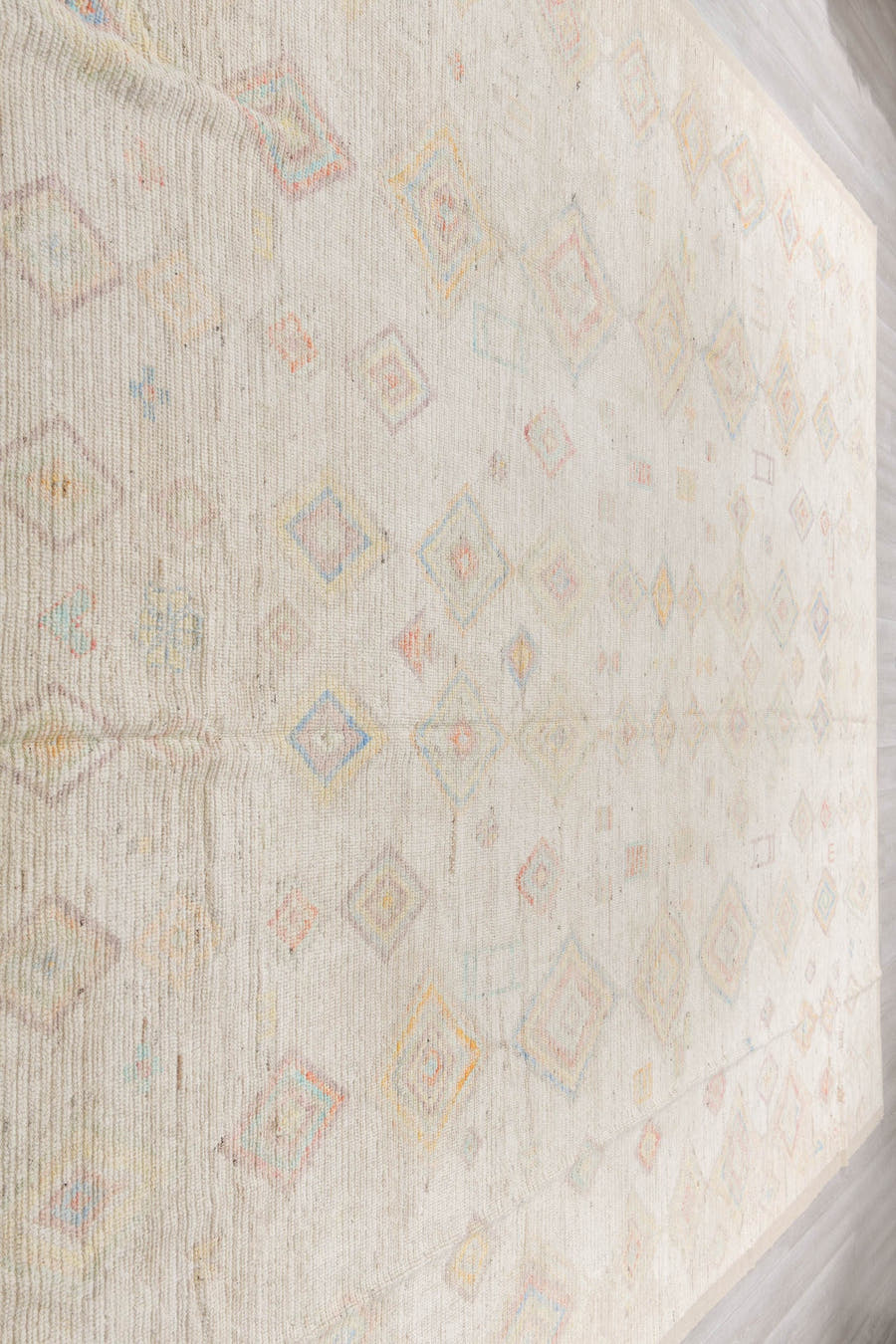 12' x 15' one-of-a-kind handmade vintage Tulu oversize rug. Color palette: ivory, cream, pale blue, coral, gold, sage