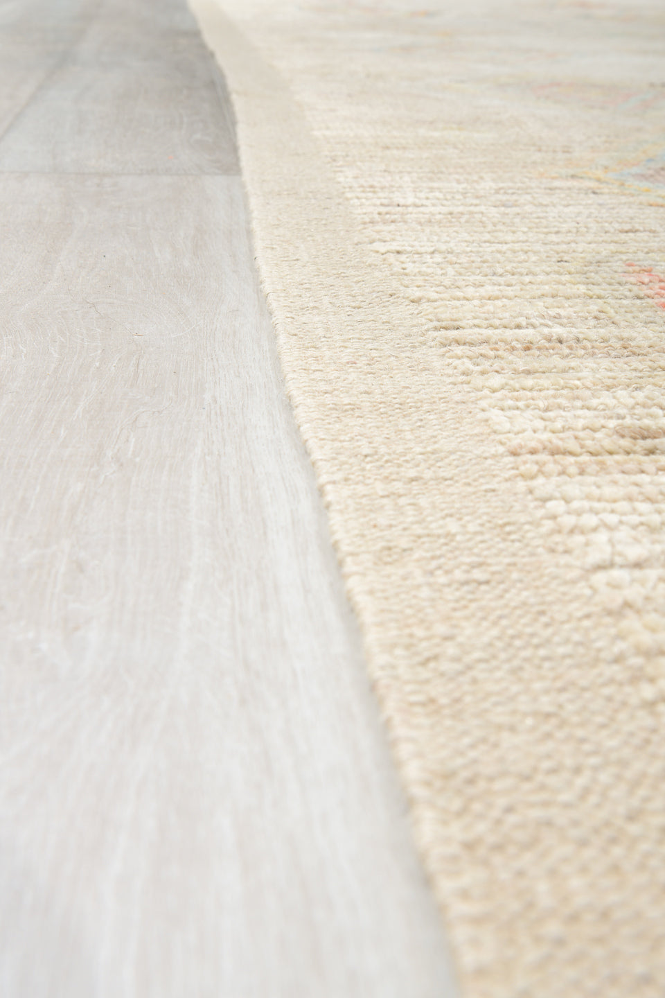 12' x 15' one-of-a-kind handmade vintage Tulu oversize rug. Color palette: ivory, cream, pale blue, coral, gold, sage