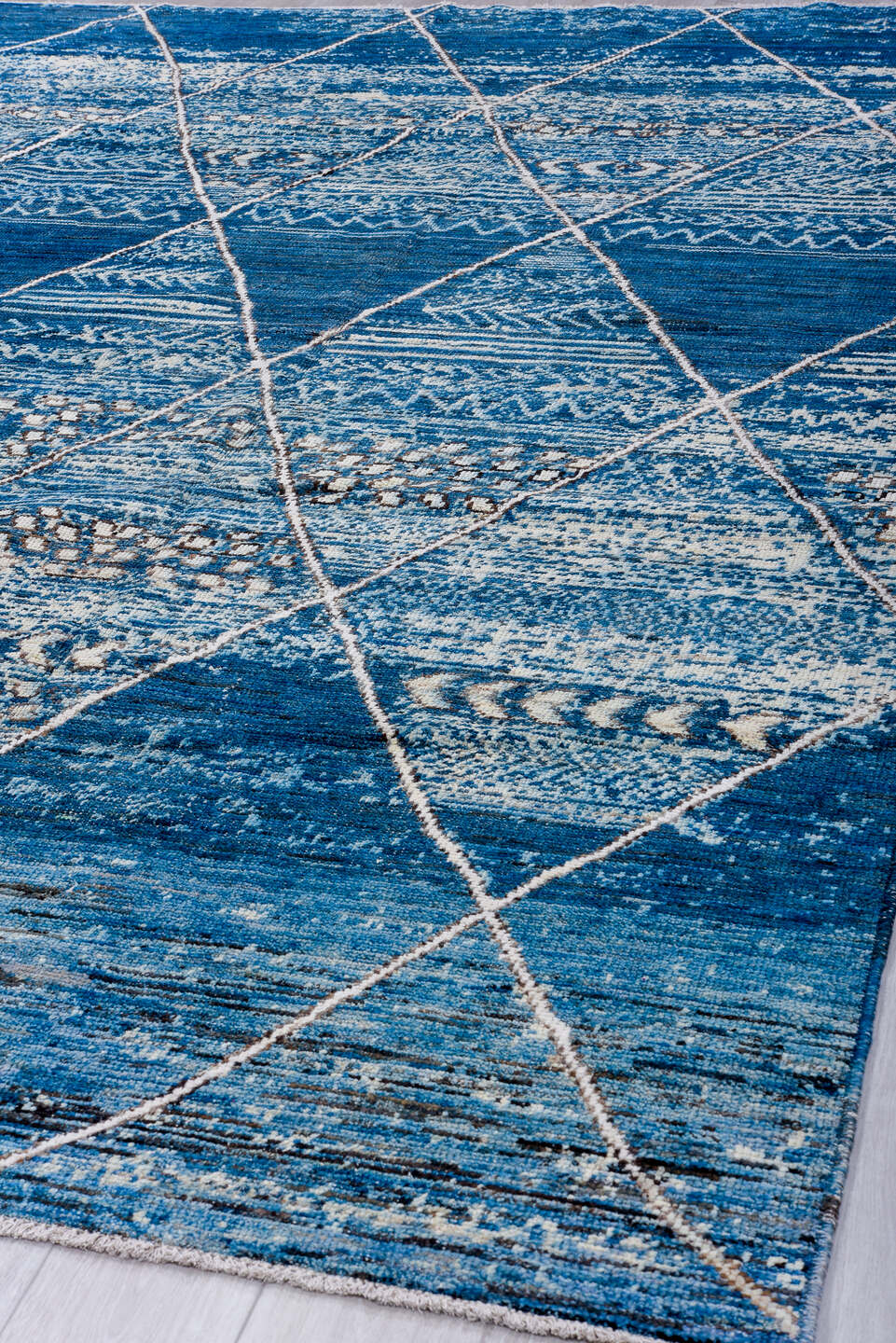 9' x 11' one-of-a-kind handmade vintage Tulu large size rug. Color palette: blue, ivory, indigo, slate, denim, purple, gray