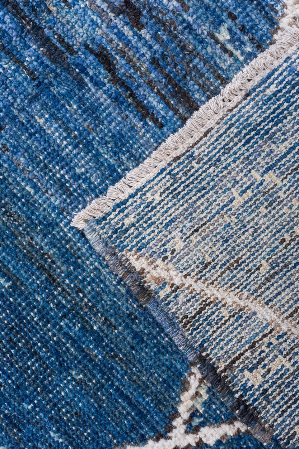 9' x 11' one-of-a-kind handmade vintage Tulu large size rug. Color palette: blue, ivory, indigo, slate, denim, purple, gray