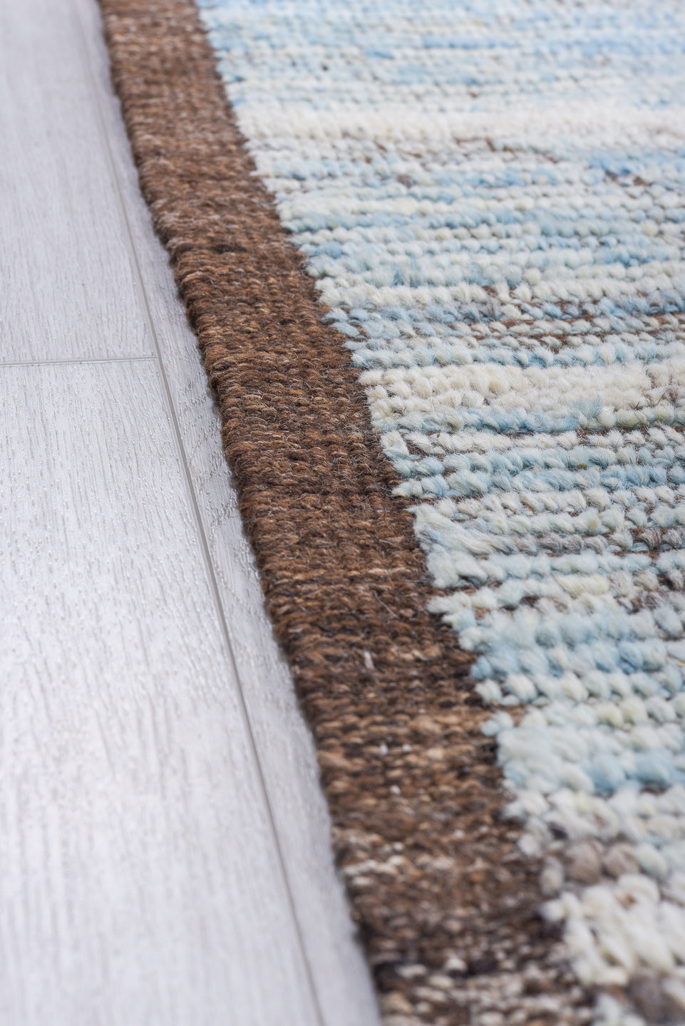 9' x 12' one-of-a-kind handmade vintage Tulu large size rug. Color palette: sky blue, ivory, taupe, brown, gray, light blue