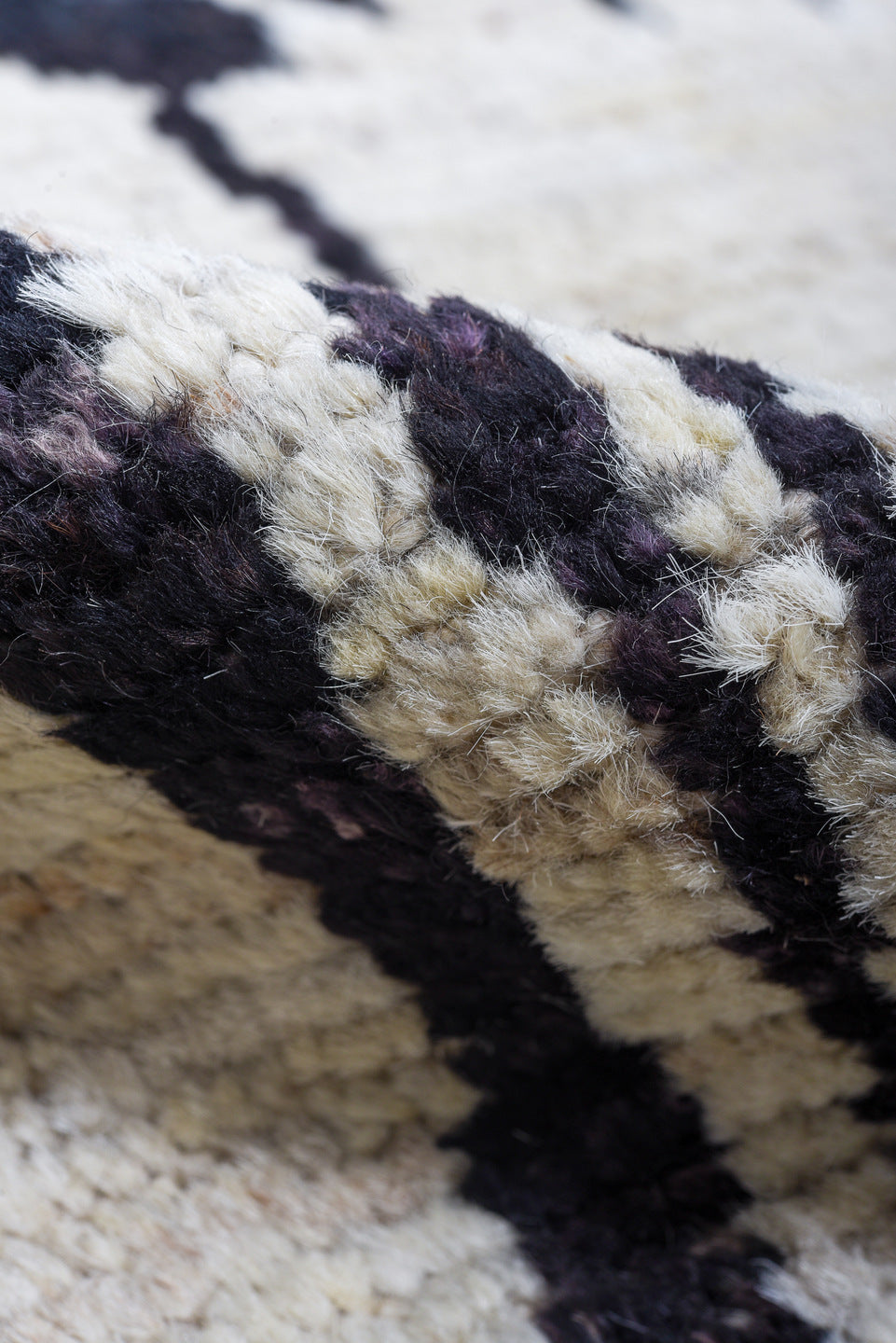 6' x 9' one-of-a-kind handmade vintage Tulu medium size rug. Color palette: ivory, charcoal, cream, taupe, gray, black