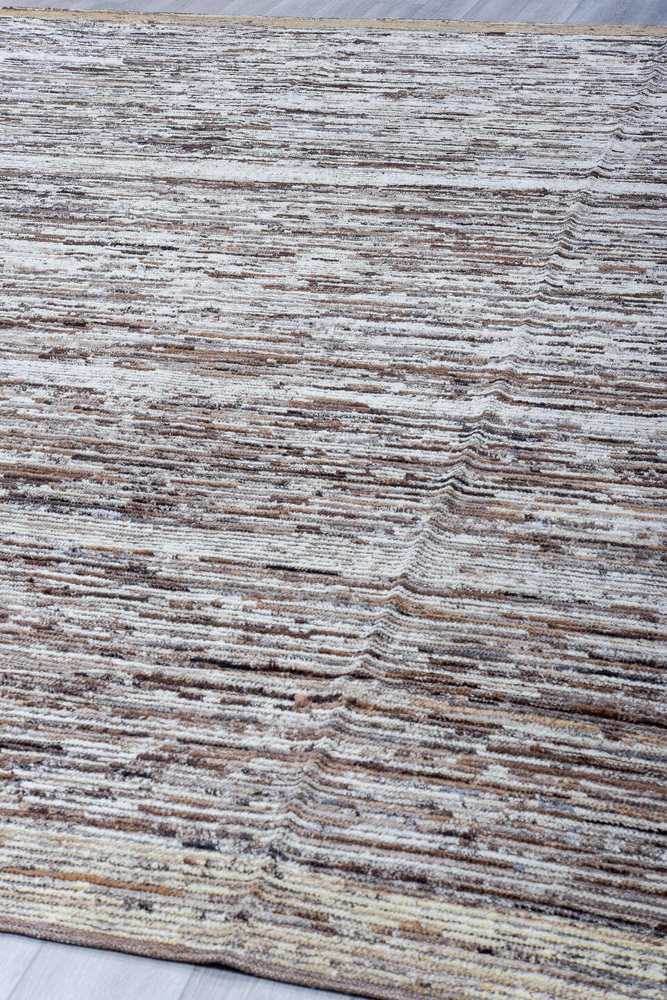 12' x 14' one-of-a-kind handmade vintage Tulu oversize rug. Color palette: ivory, taupe, brown, camel, charcoal, beige, gray