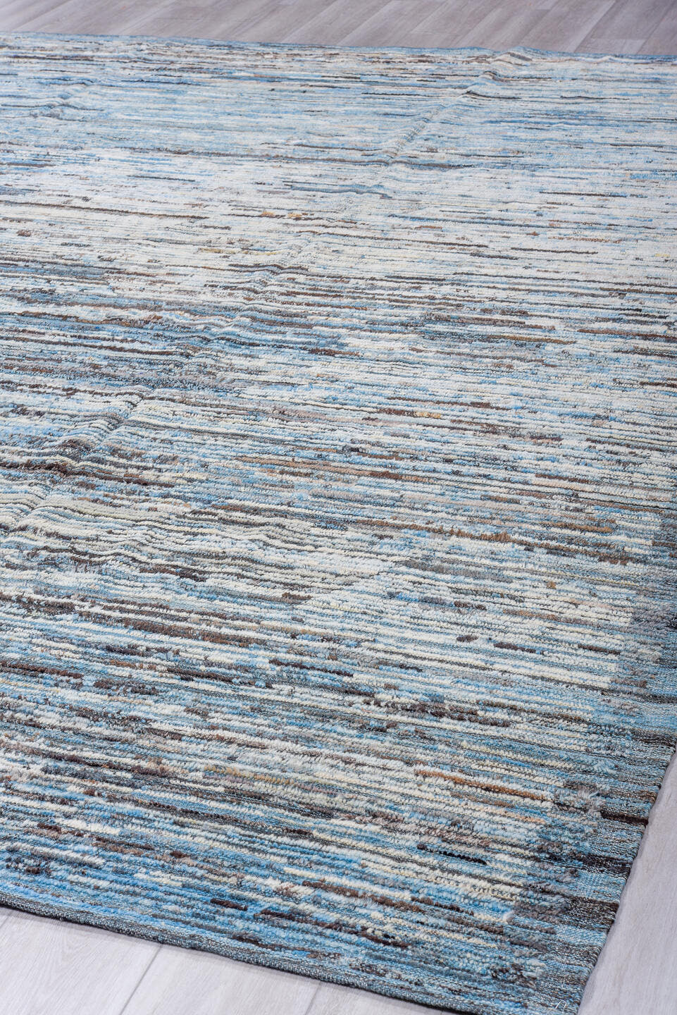 9' x 12' one-of-a-kind handmade vintage Tulu large size rug. Color palette: sky blue, ivory, charcoal, slate, steel blue