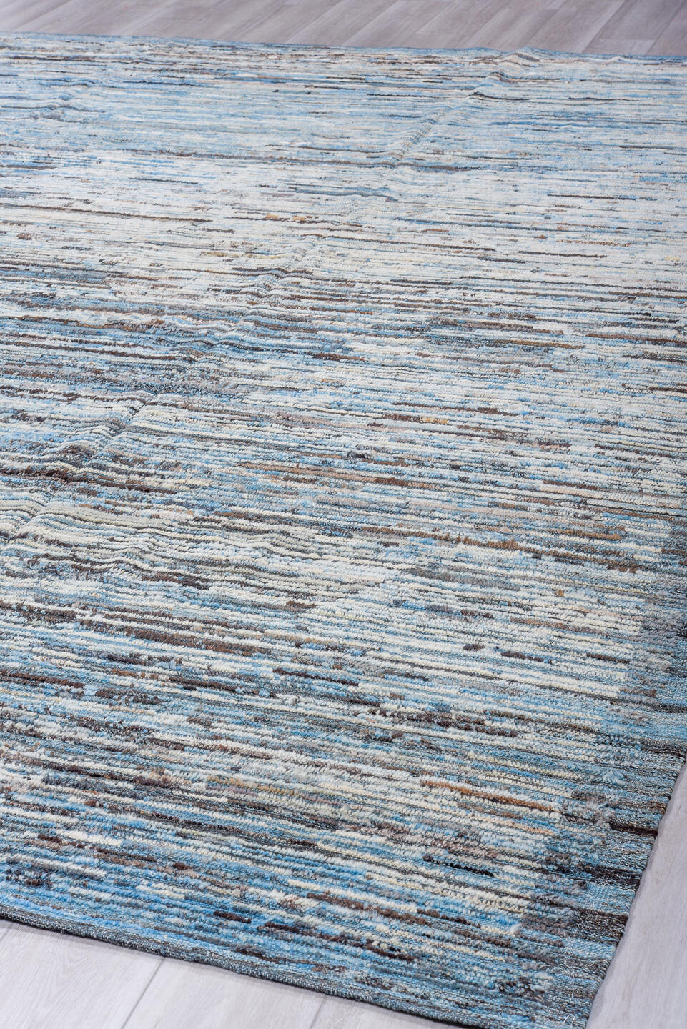 9' x 12' one-of-a-kind handmade vintage Tulu large size rug. Color palette: sky blue, ivory, charcoal, slate, steel blue